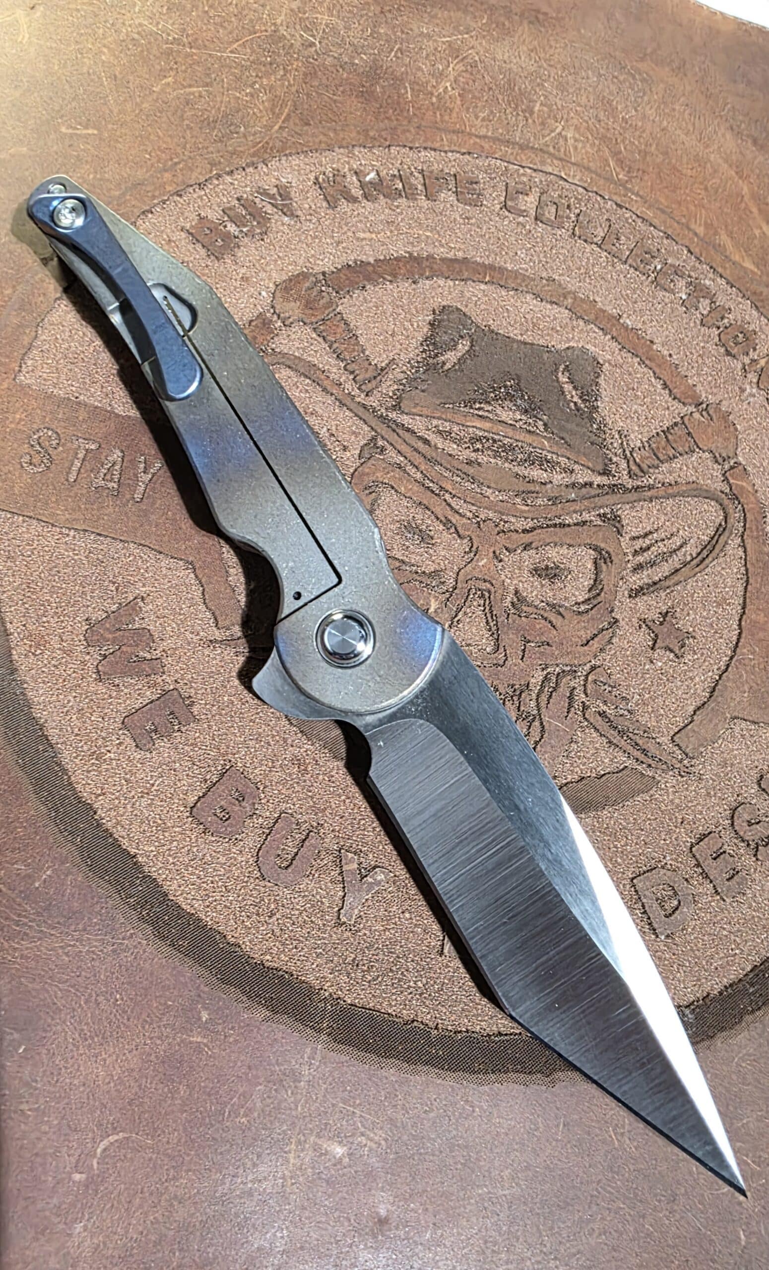 DSK Tactical Custom Prick knife showing CPM 154 blade and countersunk and anodized titanium handle hardware