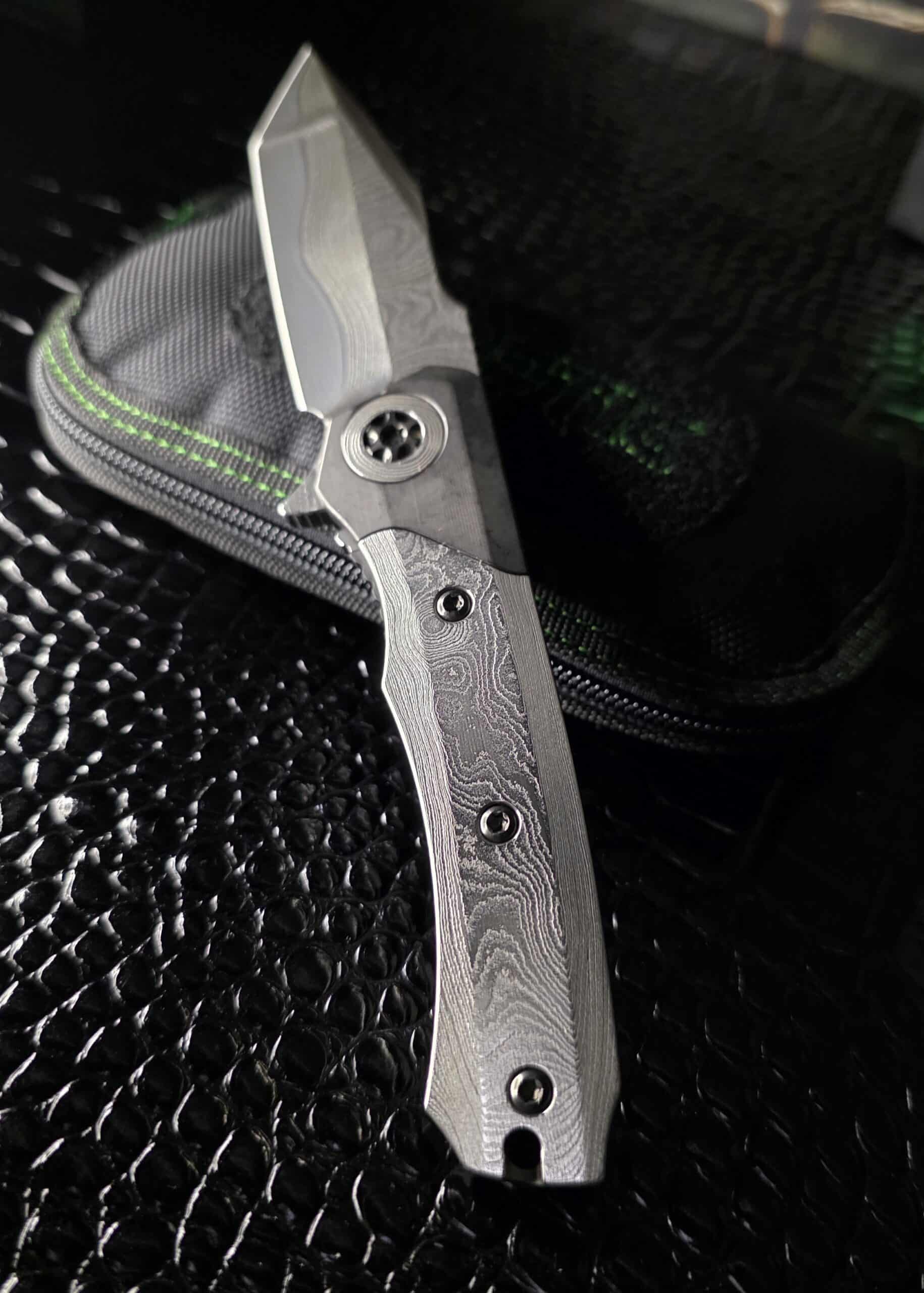 Heretic Knives Custom Wraith manual flipper with Vegas Forge San Mai Damascus tanto blade