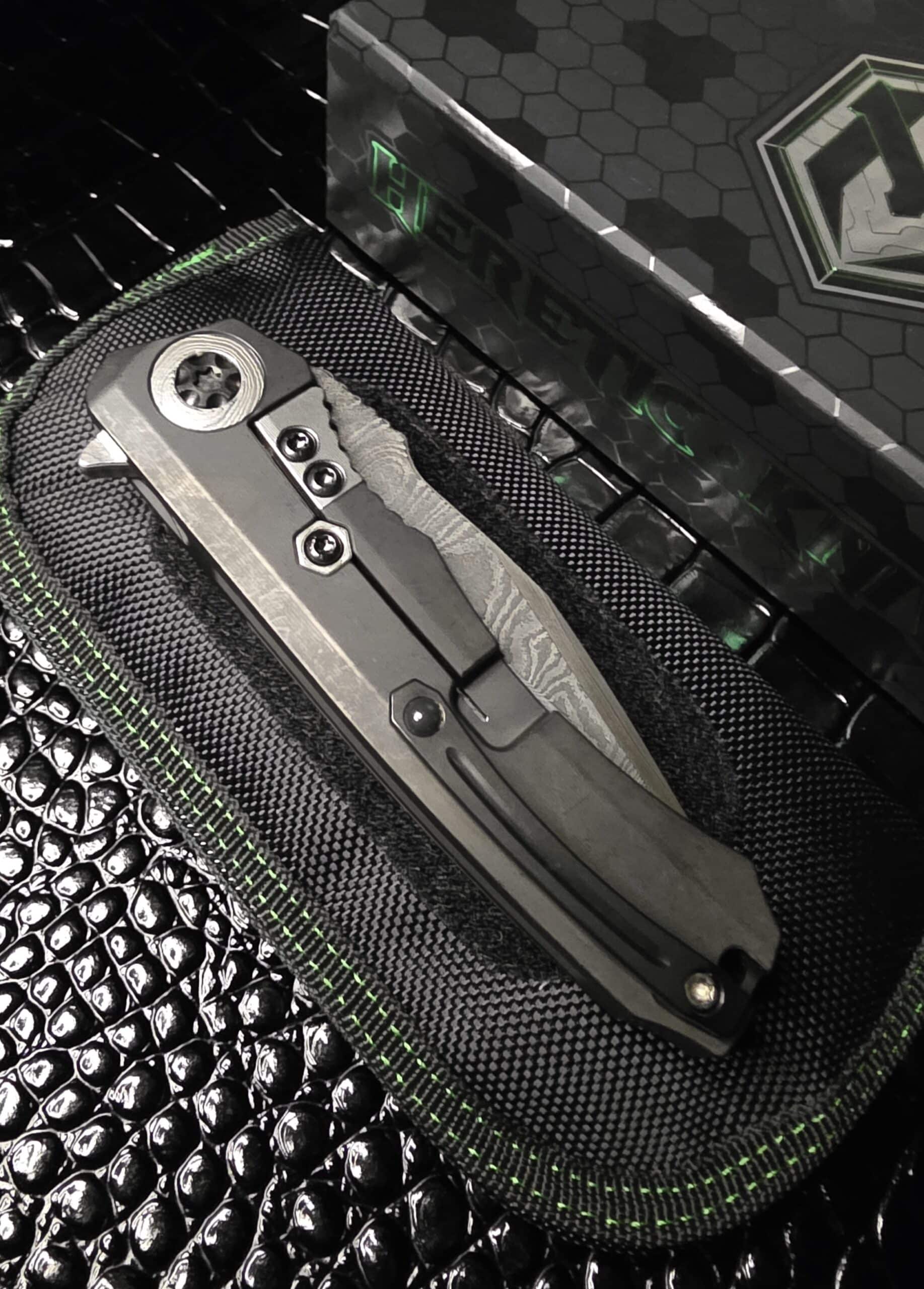 Side profile of Custom Wraith folding knife with Damascus blade
