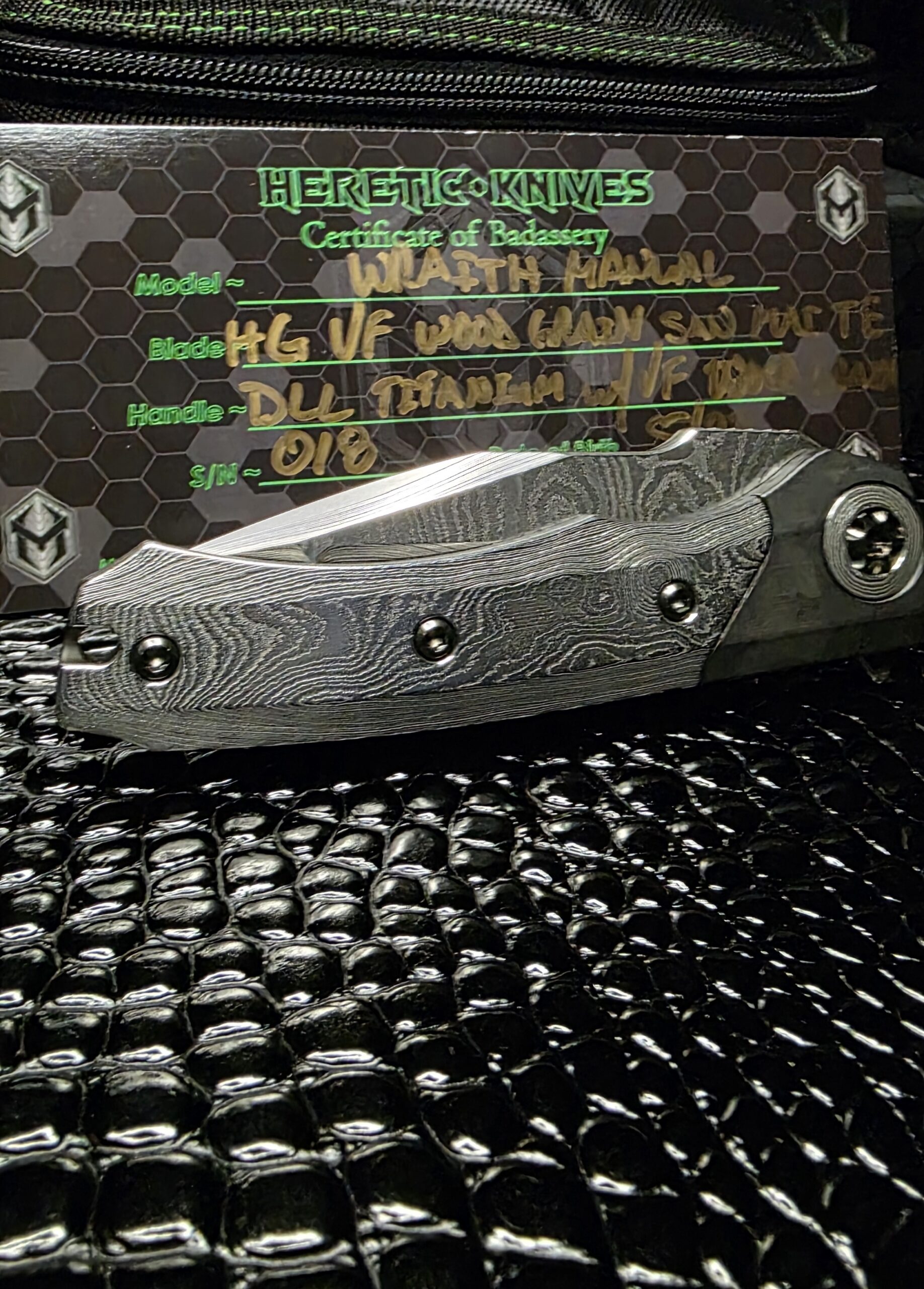 Custom Heretic Wraith folding knife photographed for WBKC product listing