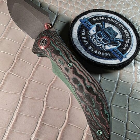 Melvin Lozada Custom Icon 3.5 featuring a CPM Magnacut bead blast blade and shipwreck camo quartz scales.