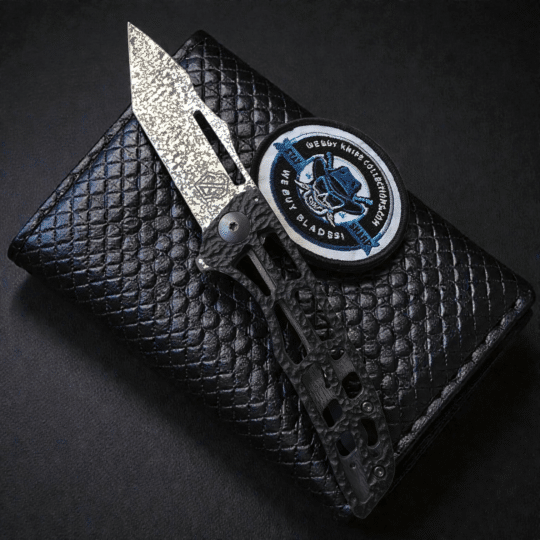 John Gray Slitter V2 Magnacut tanto blade with ported titanium frame lock handle