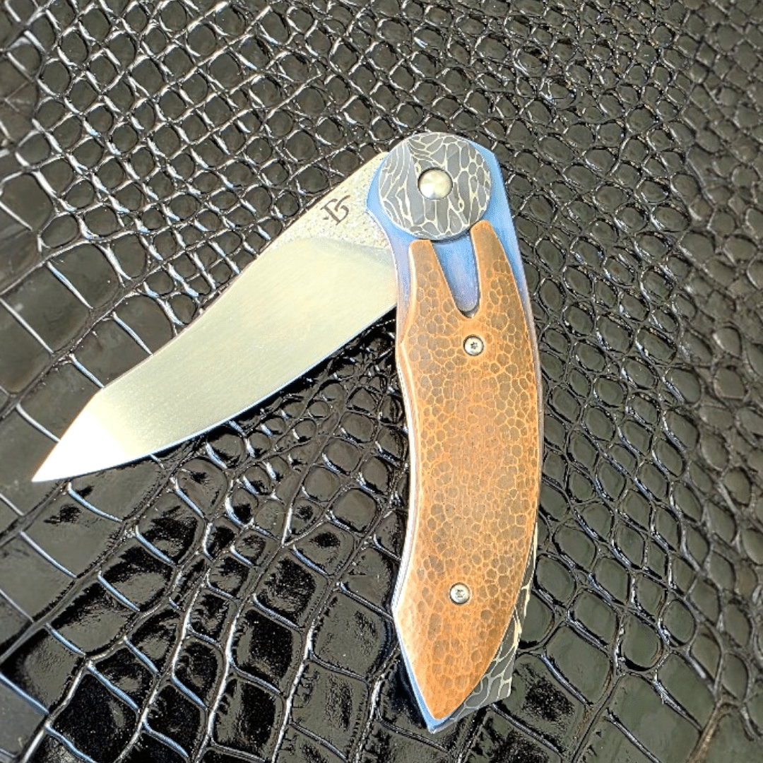 Sculpted bronze handle on David Broadwell Custom Knife