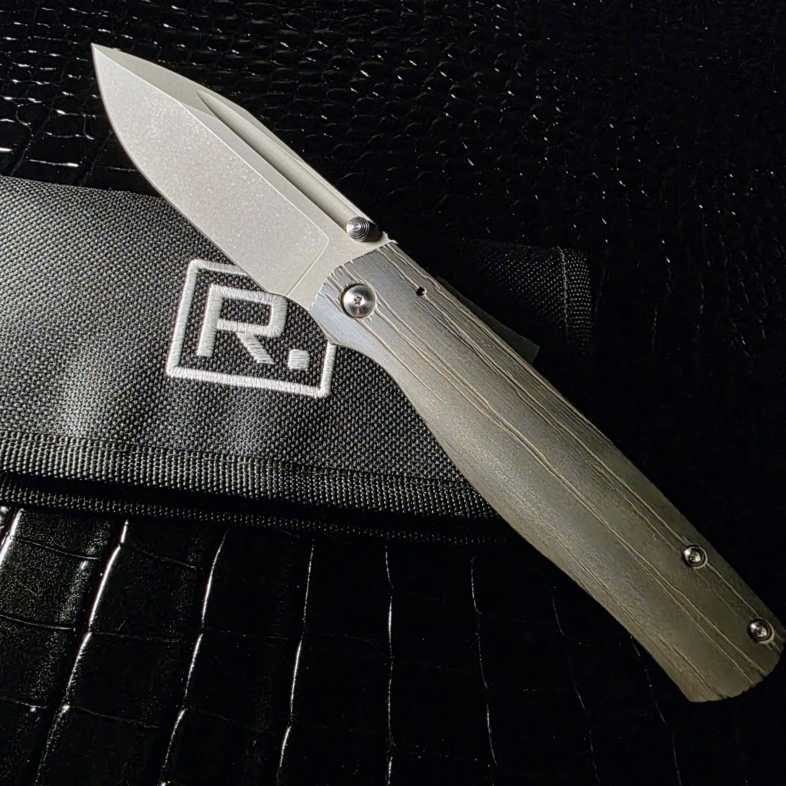 Ray Laconico Custom Albatross original pouch opened showing storage for the knife