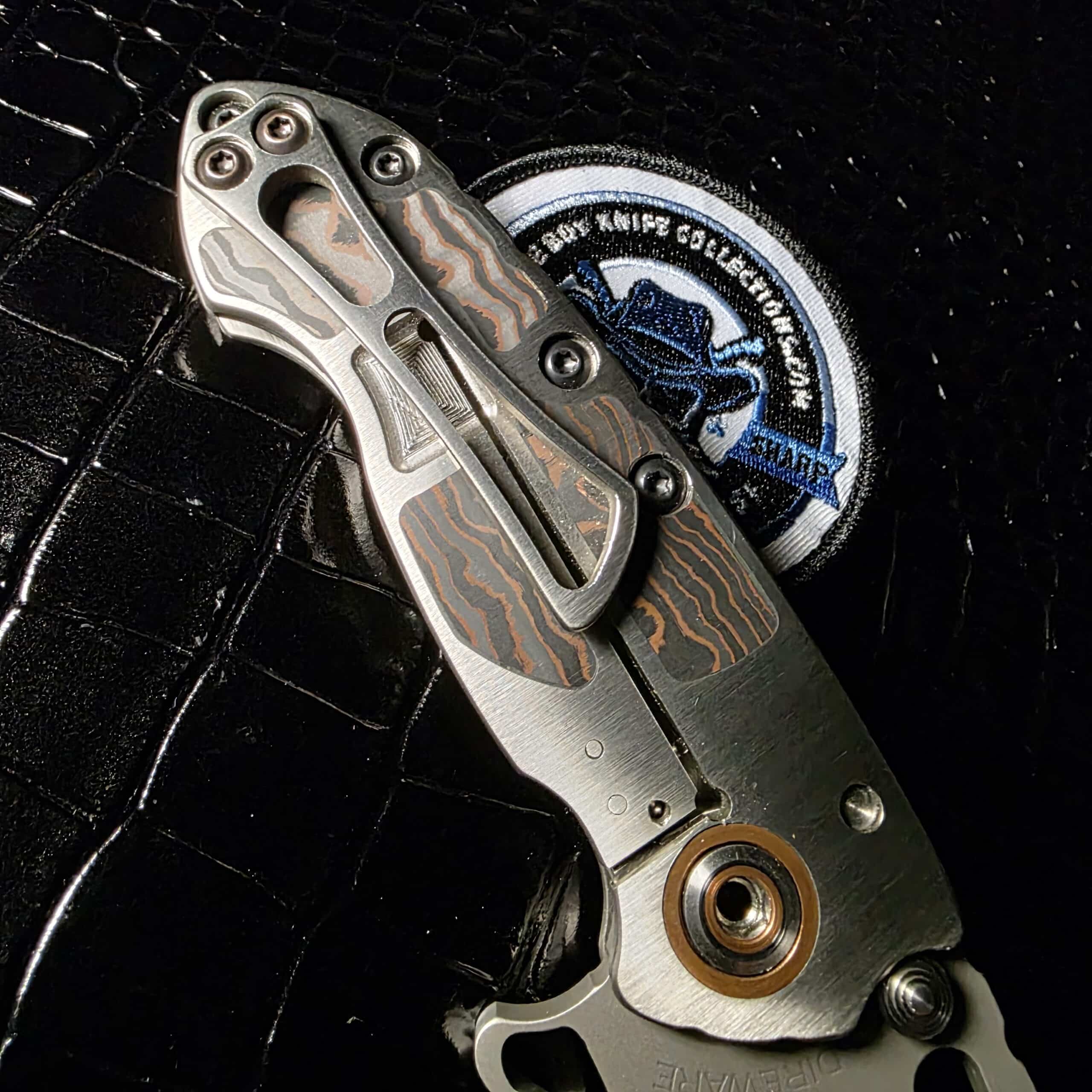 Direware Solo Custom edge and tanto tip close-up on CPM-20CV recurve blade