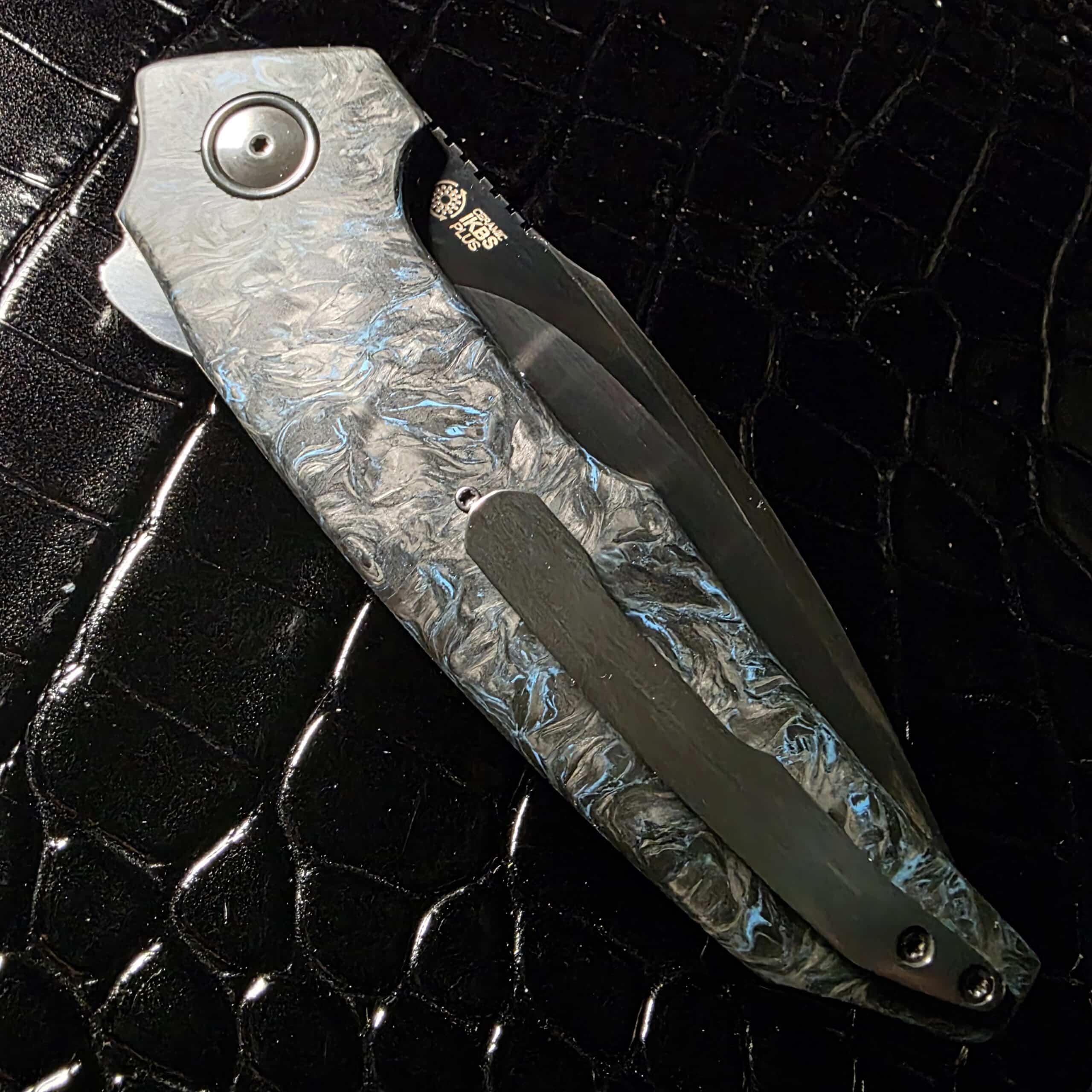 A2 Knives A6R Flipper clip side closed view showing liner lock side and titanium frame