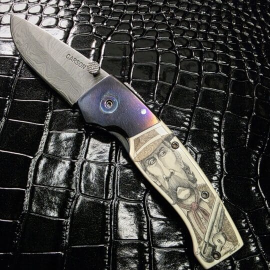 Kit Carson custom folding knife open view with 3 inch Damascus blade and scrimshaw ivory scales
