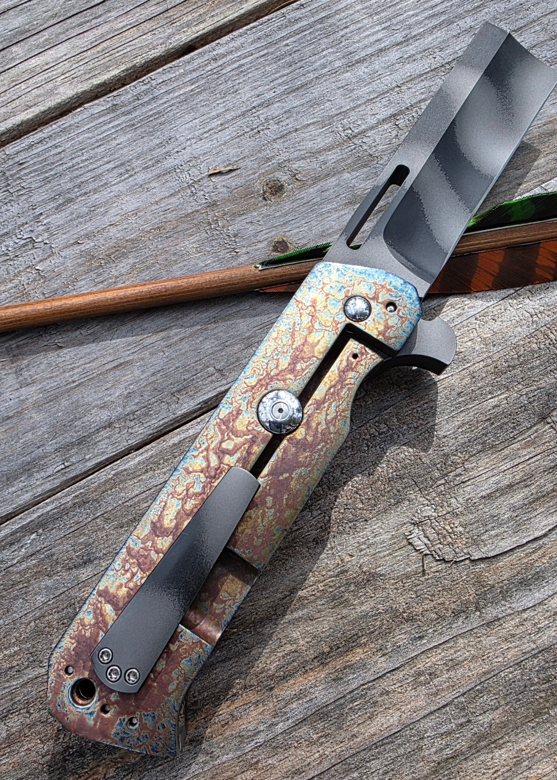 Clip side of Reese Weiland Custom Fatty Slasher Flipper showing the titanium pocket clip.