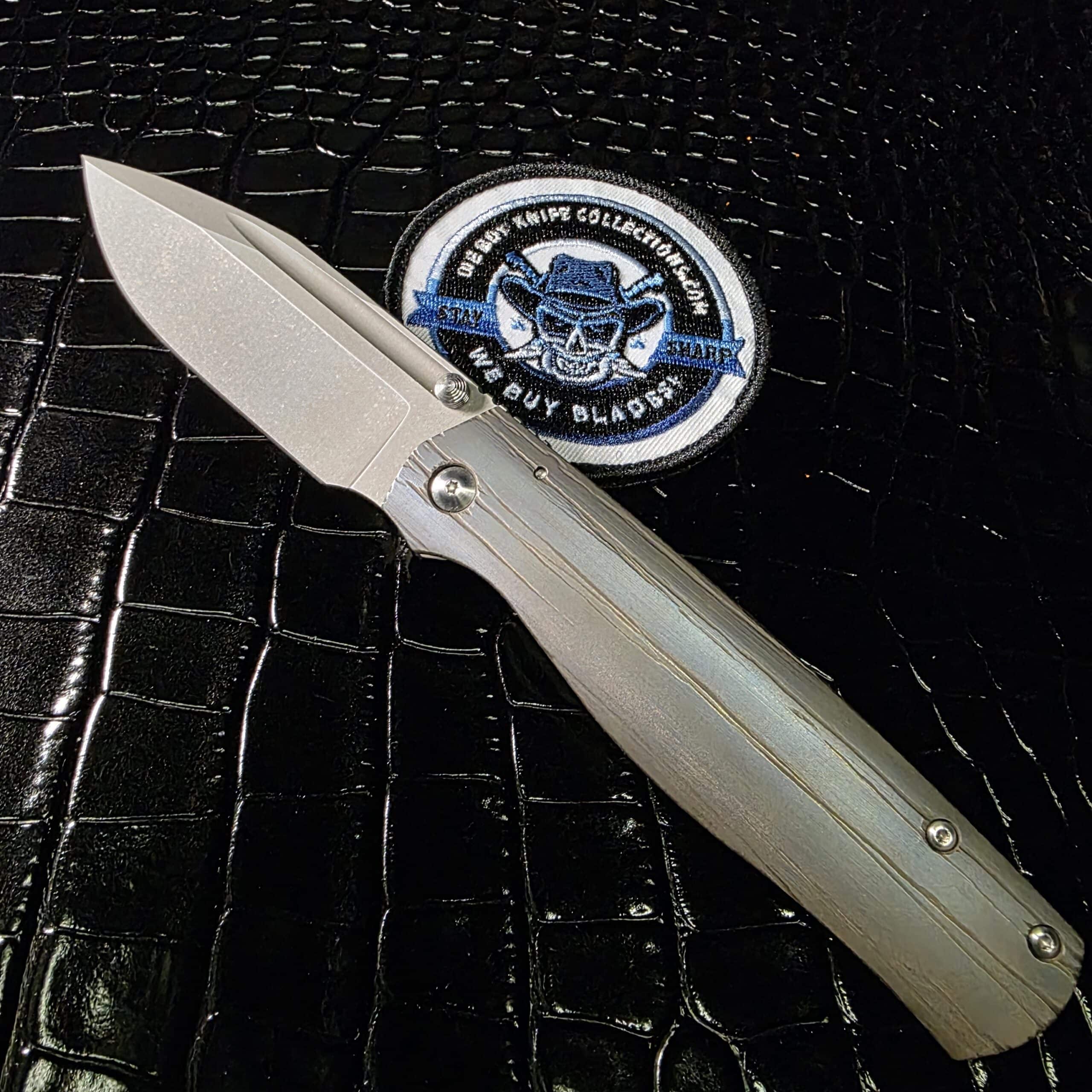 Ray Laconico Custom Albatross with stonewashed CPM 154 clip point blade and titanium frame lock