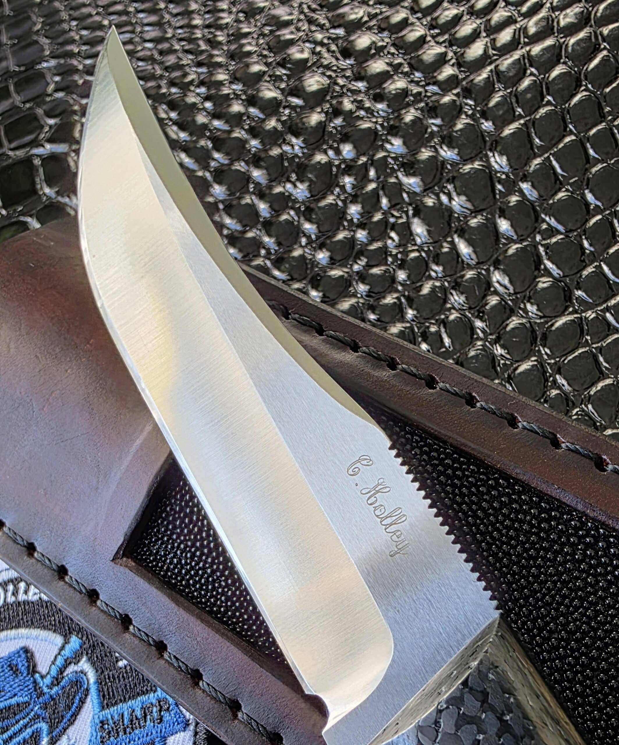 Left side profile of the Holley fixed blade hunter blade grind.