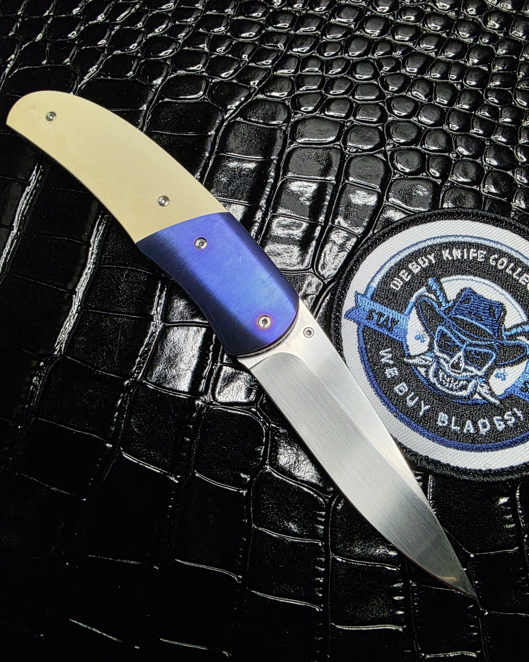 Clip side of the Buddy Gaines Custom Knife showing the titanium liners.