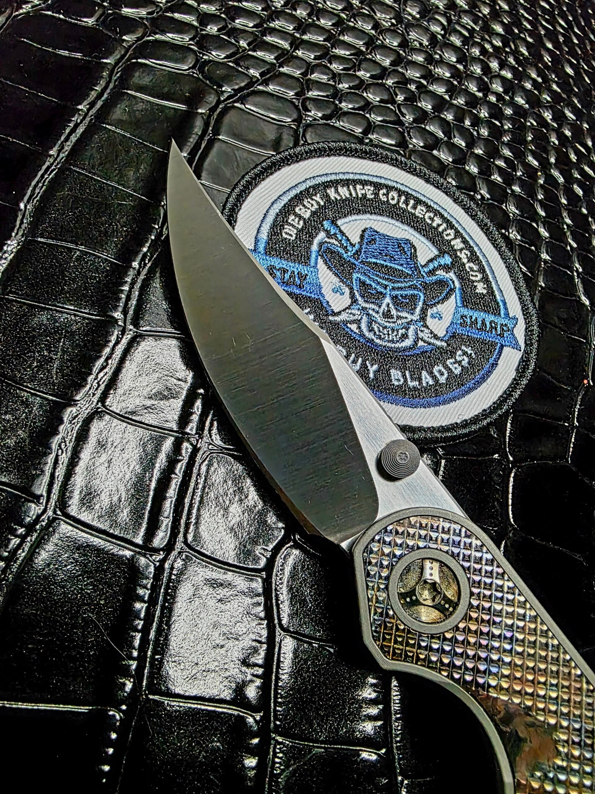 Macro view of the CPM 154 blade tip on a Hypercut Bikkhu.