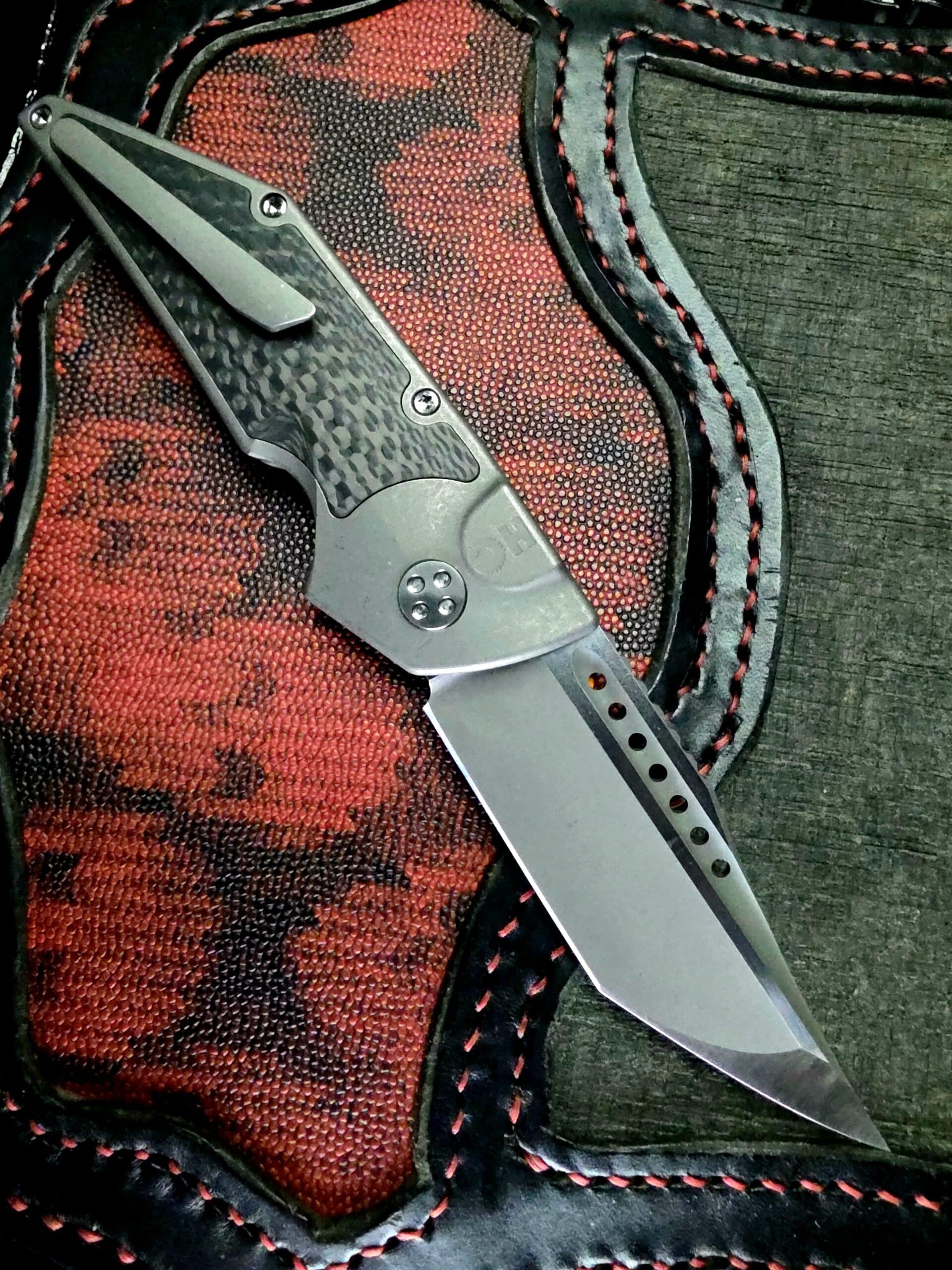 Clip side of Hypercut Manufacturing Dharma Prototype showing the titanium frame lock and clip.