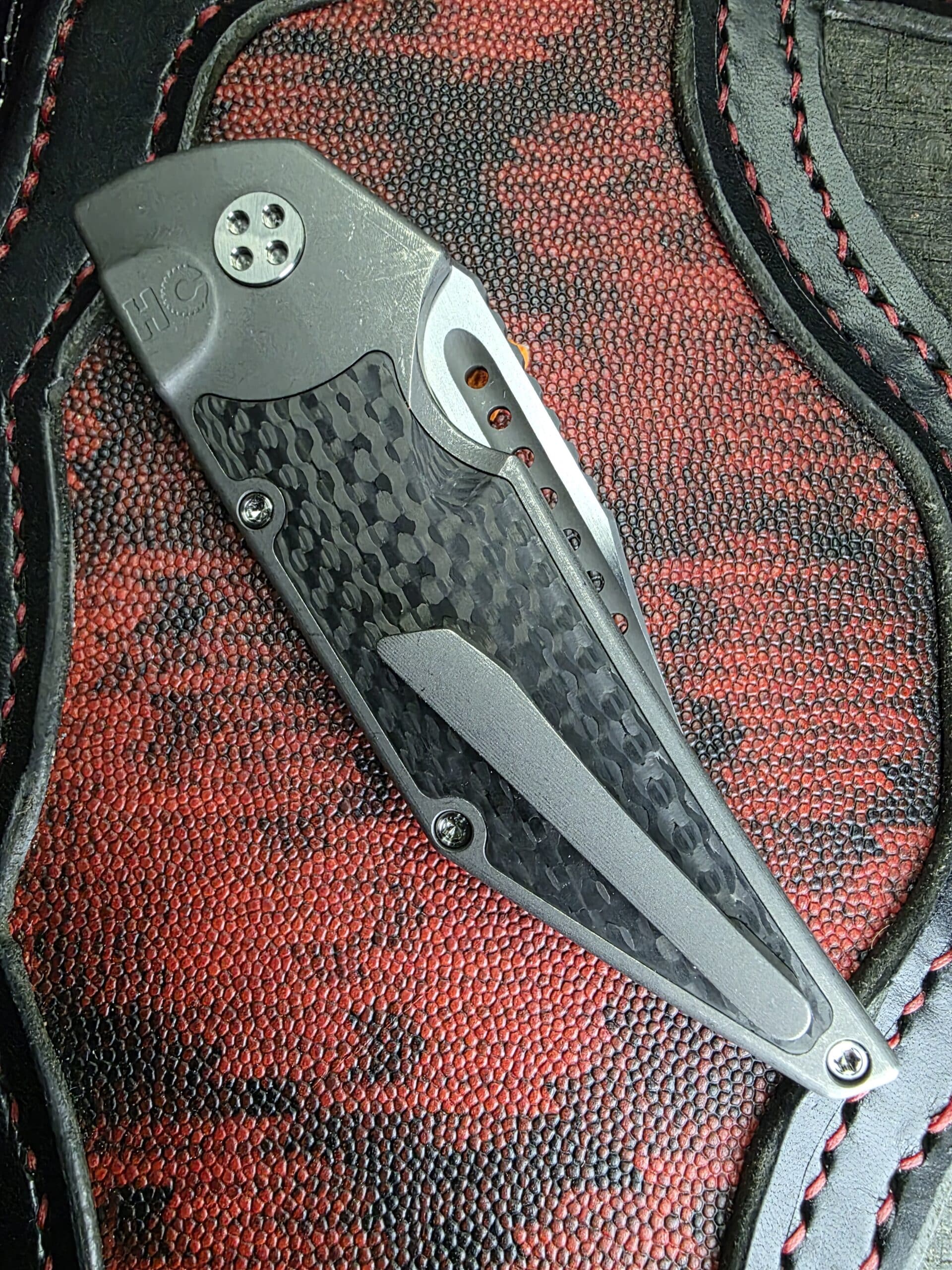 Top-down view of the titanium pocket clip on the Dharma Prototype.