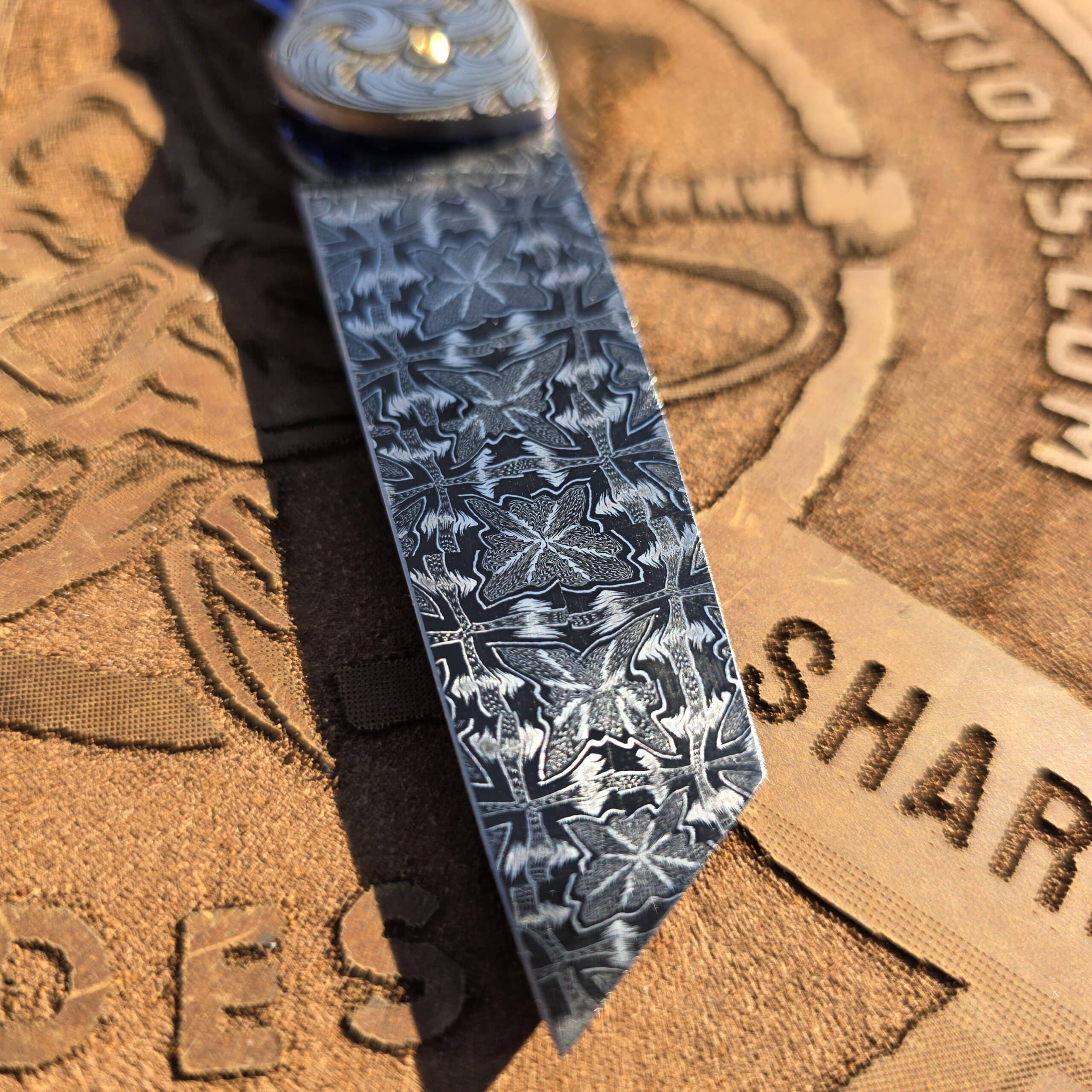 Extreme macro of the Butterfly Damascus pattern on the Curt Zimmermann blade.