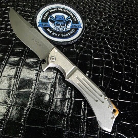 Dervish Knives TAD Alchemy Mid-Tech folding knife with Stonewash Finish blade and copper backspacer.