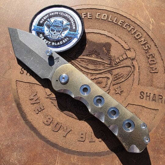 DSK Tactical GF2 Custom Knife with Damasteel blade and two-tone gold anodized titanium handle.
