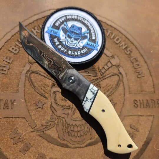 Eliot Maldonado Custom Fixed Blade with Baker Forge Cu-Mai copper-layered blade and Robs Wildwood segmented handle.