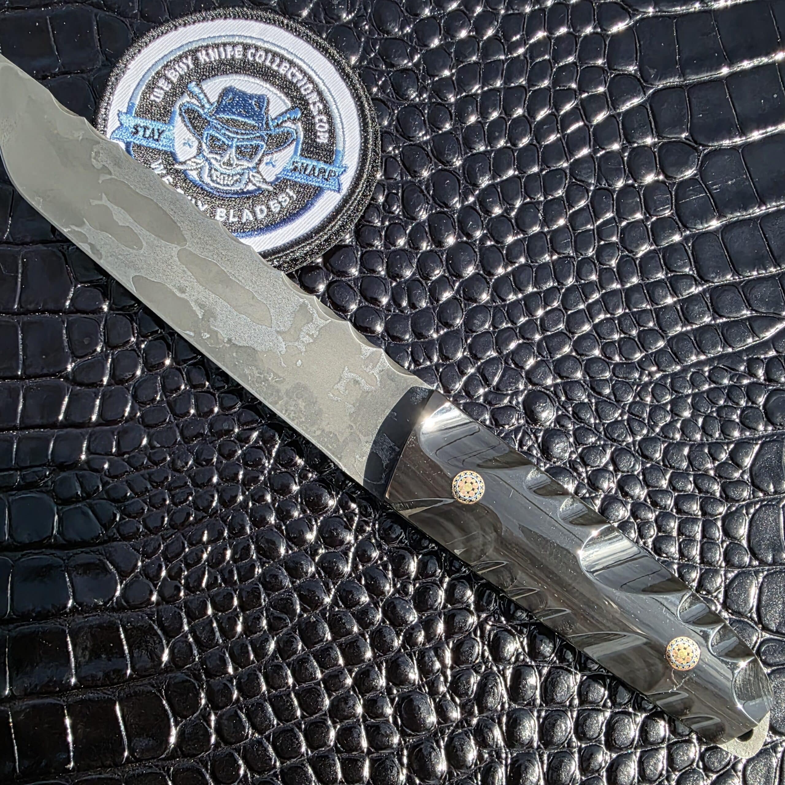 Side two of Haymaker Customs Katana Fixed Blade showing canister Damascus bursting from 80CrV2