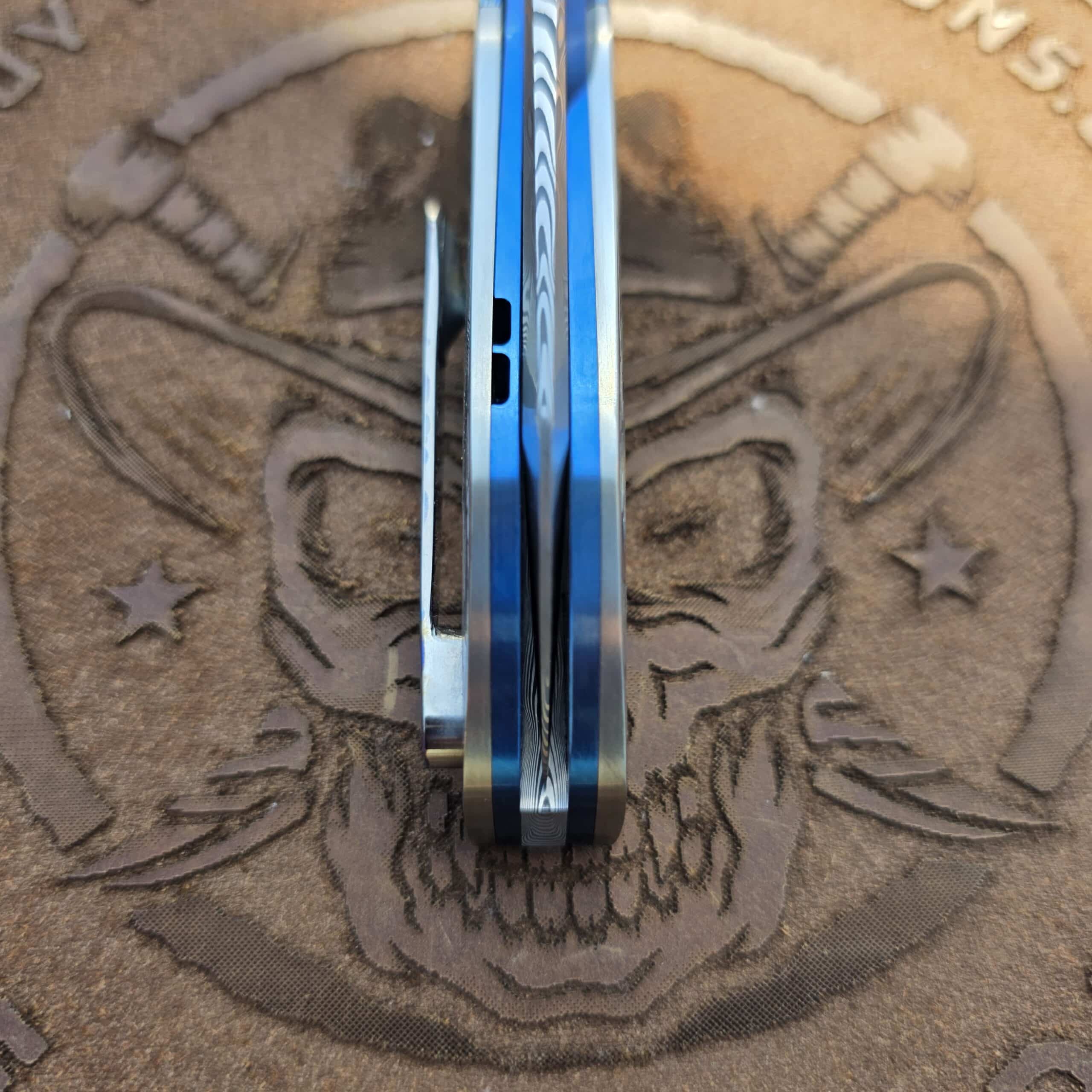 Technical down-the-channel shot verifying perfect blade centering on the Herucus Blomerus HB18 custom folder.