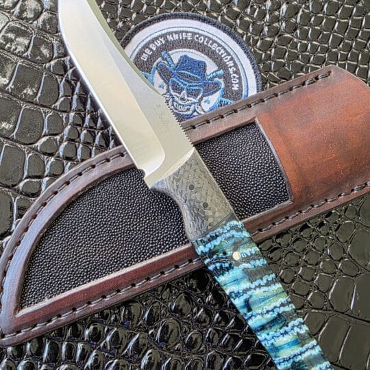Holley Knife Company Custom Hunter with mammoth tooth handle, carbon fiber bolsters, and N690 stainless blade.