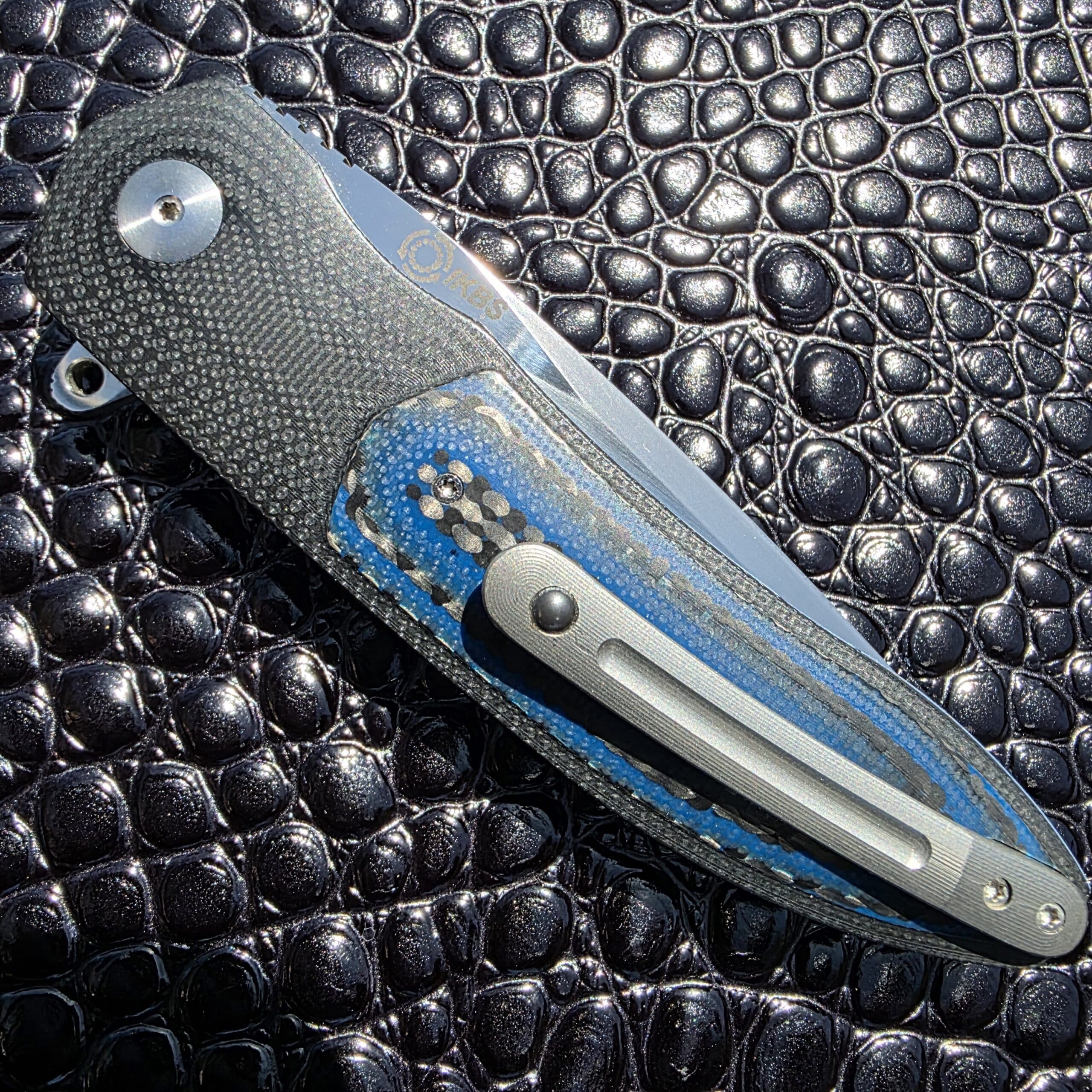 The 3D machined titanium pocket clip on a Keith Kruger K4 custom flipper.