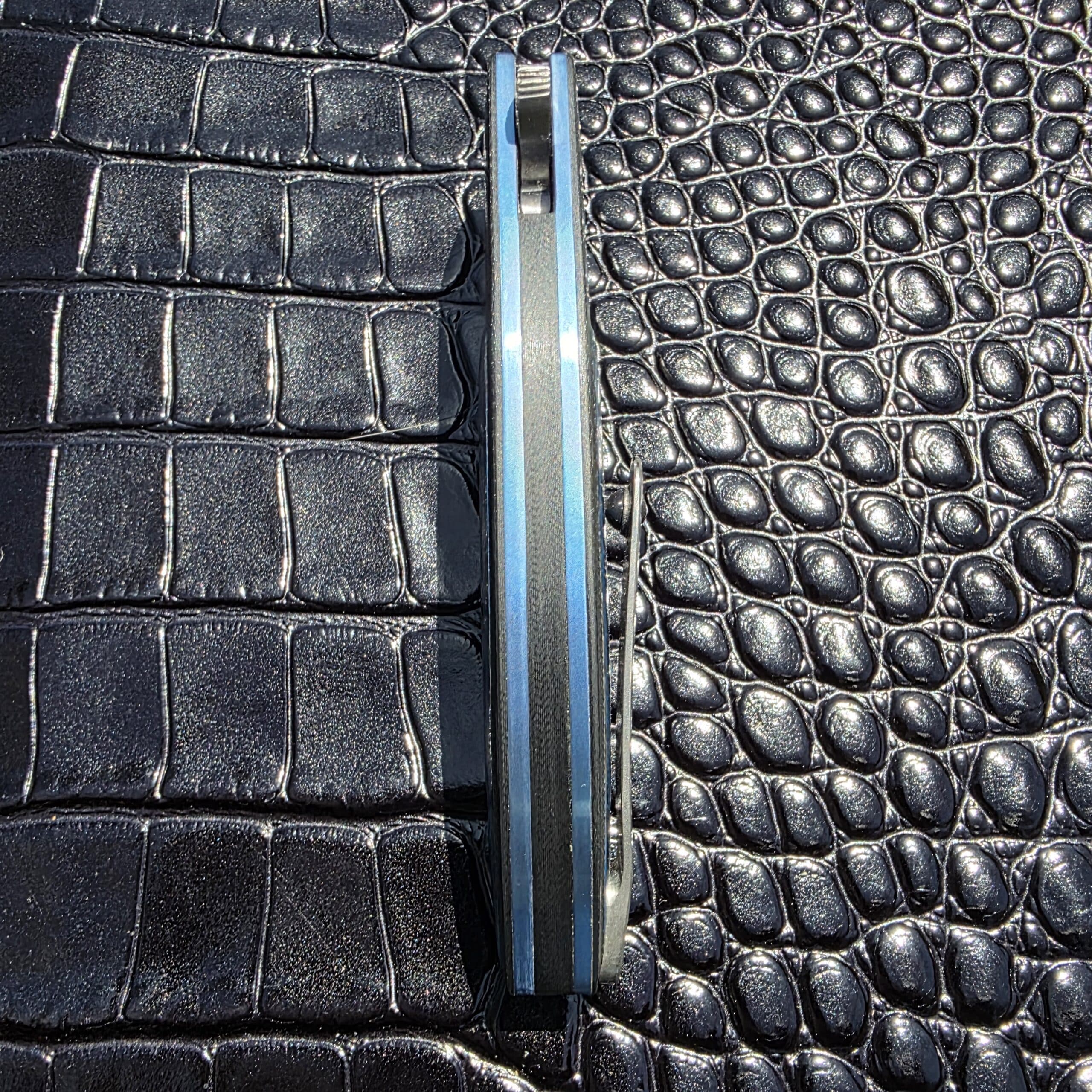 View of the satin-finished blade spine on the K4 flipper.