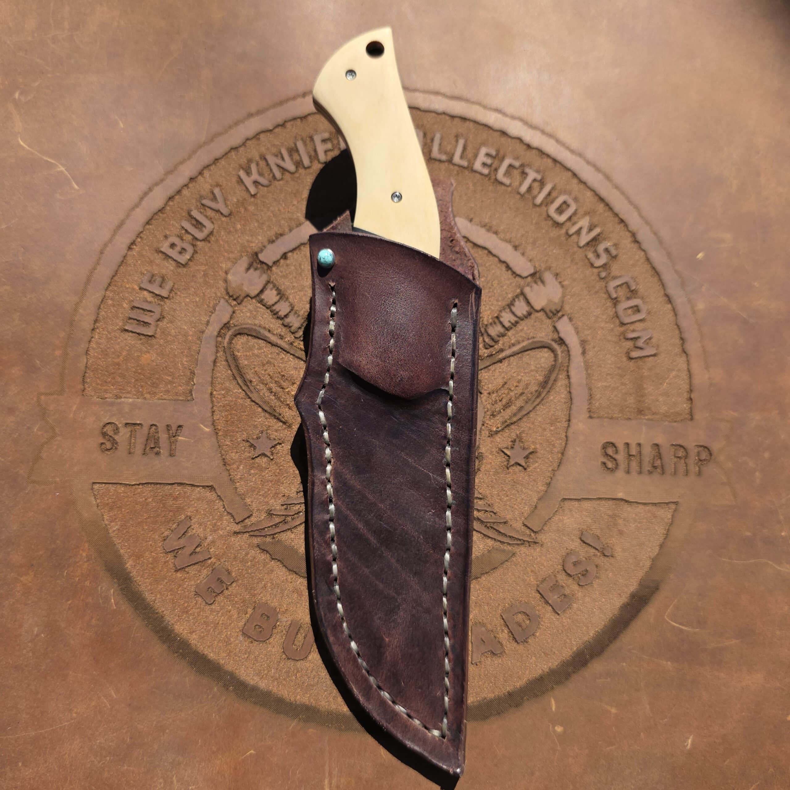 Close-up of the hand-stitching and Turquoise inlay on the Maldonado sheath.