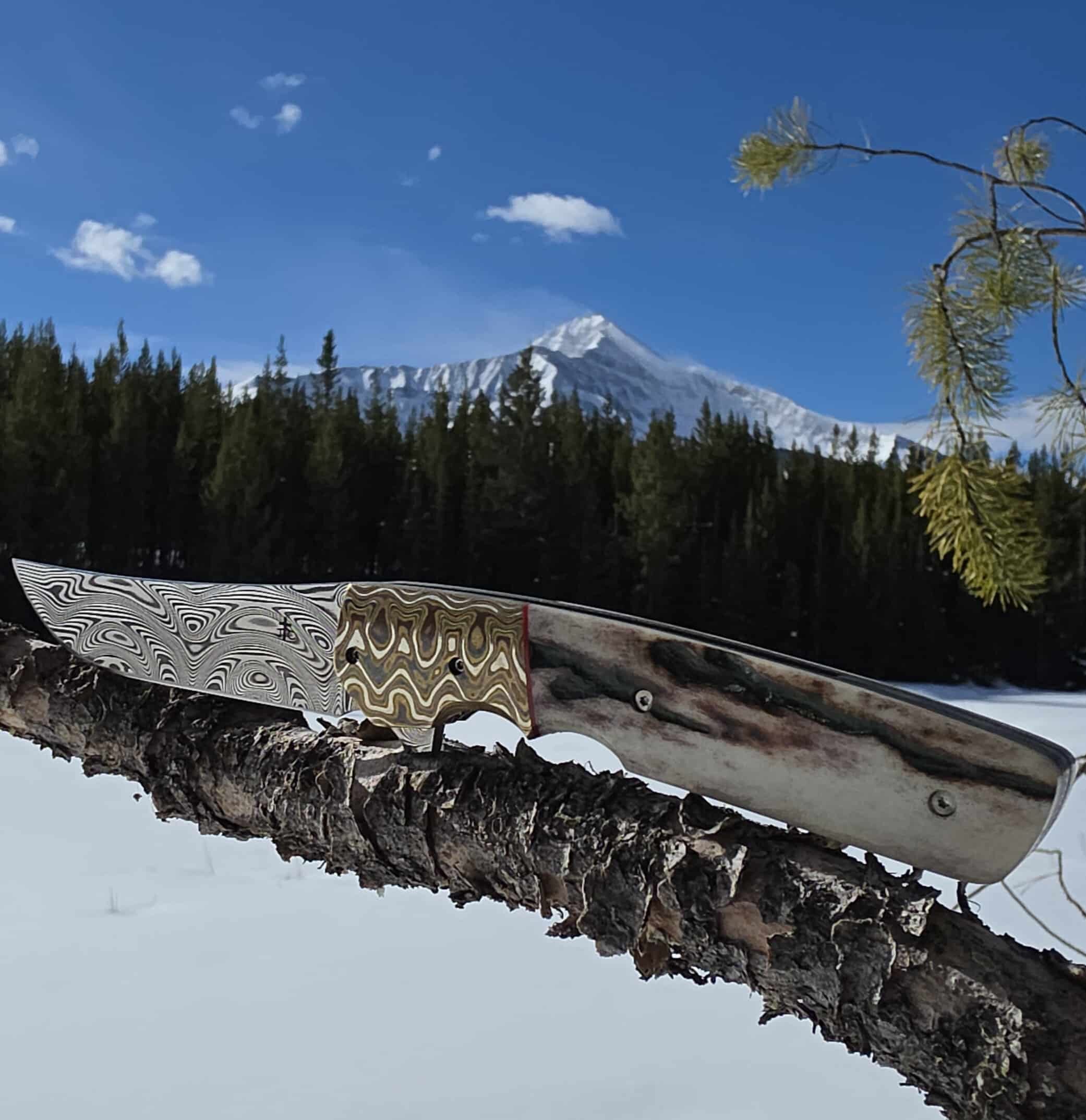 Master custom knife maker hand-crafting a collector blade — showcasing blade artistry and tradition
