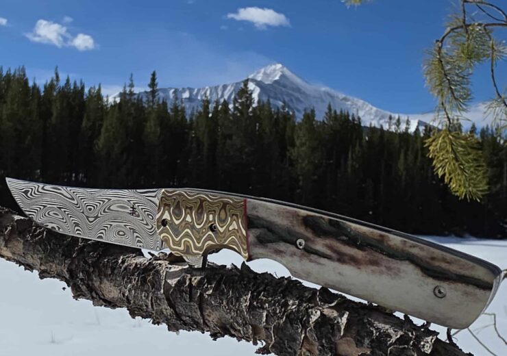 Master custom knife maker hand-crafting a collector blade — showcasing blade artistry and tradition