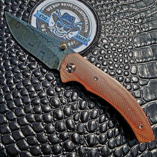 Melvin Lozada Saber Cub 3.0 Prototype #2 with hot blued Brad Vice Damascus blade and vintage brown micarta handle