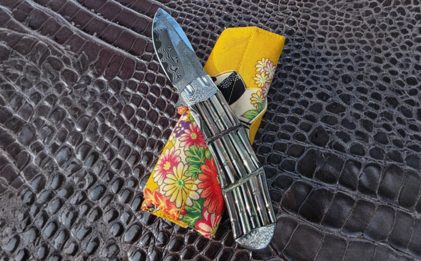 High-end custom knives from valuable makers displayed for collector comparison