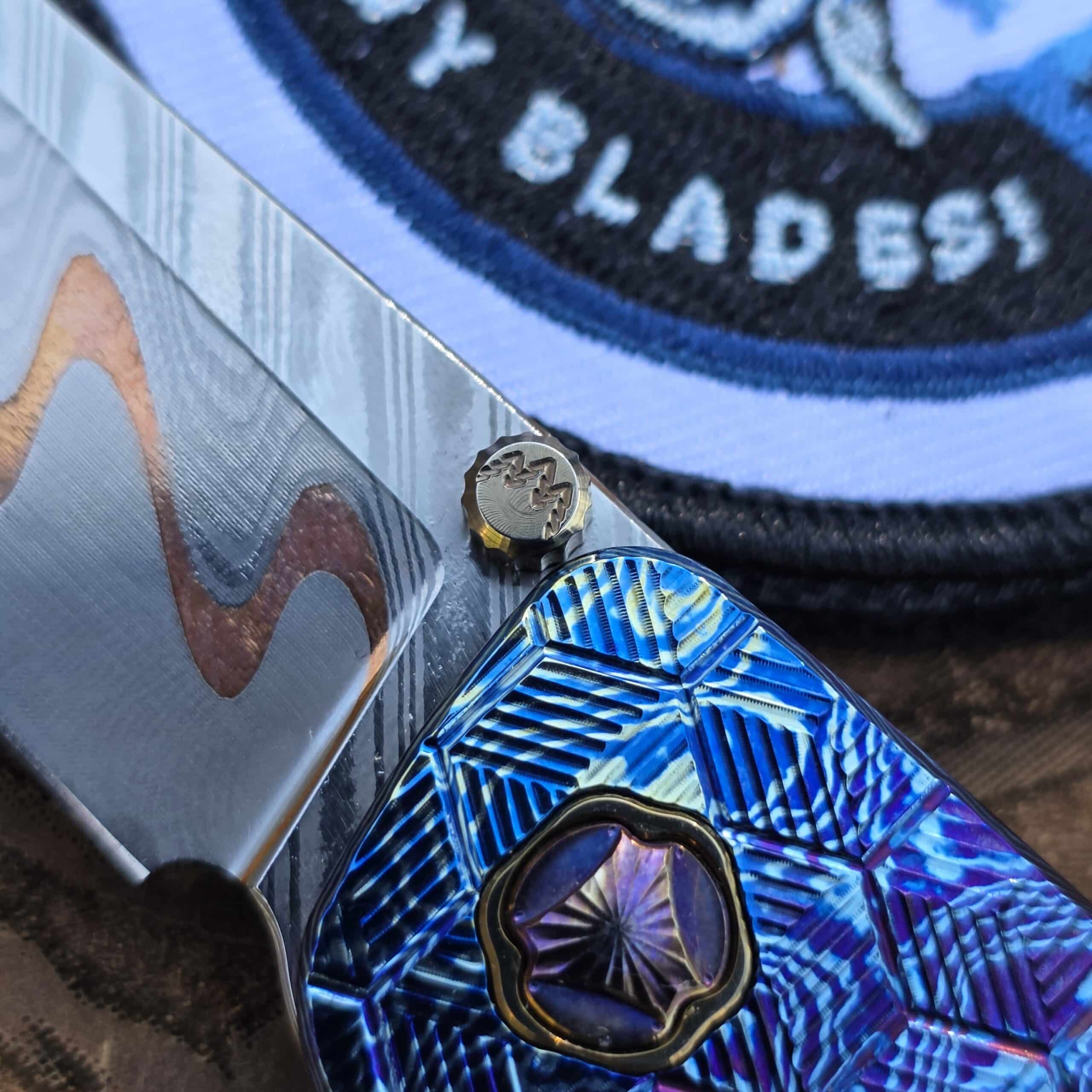 Vibrant Gold Titanium hardware accents on a custom Robjohnsons V3 knife.