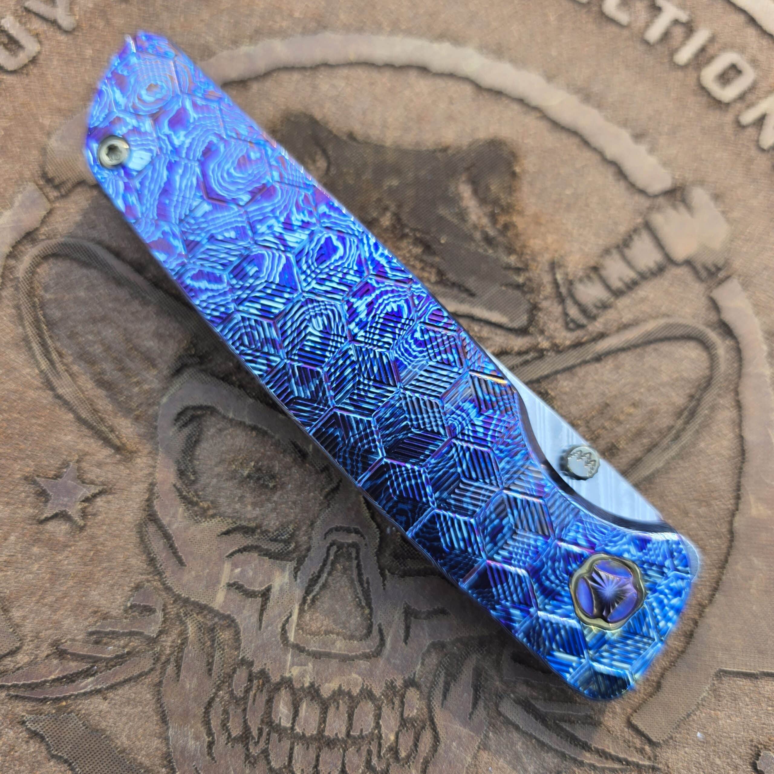 Precision-milled 3D Cubes pattern on polished Timascus scales.