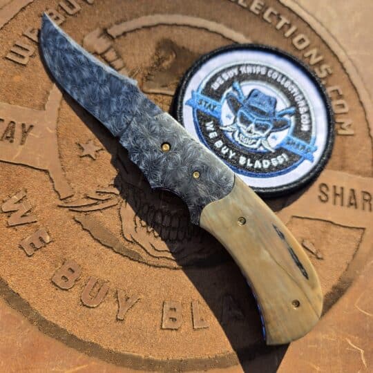 Profile view of the Scott Gallagher Sukattuk Flipper with mosaic Damascus and mammoth ivory.