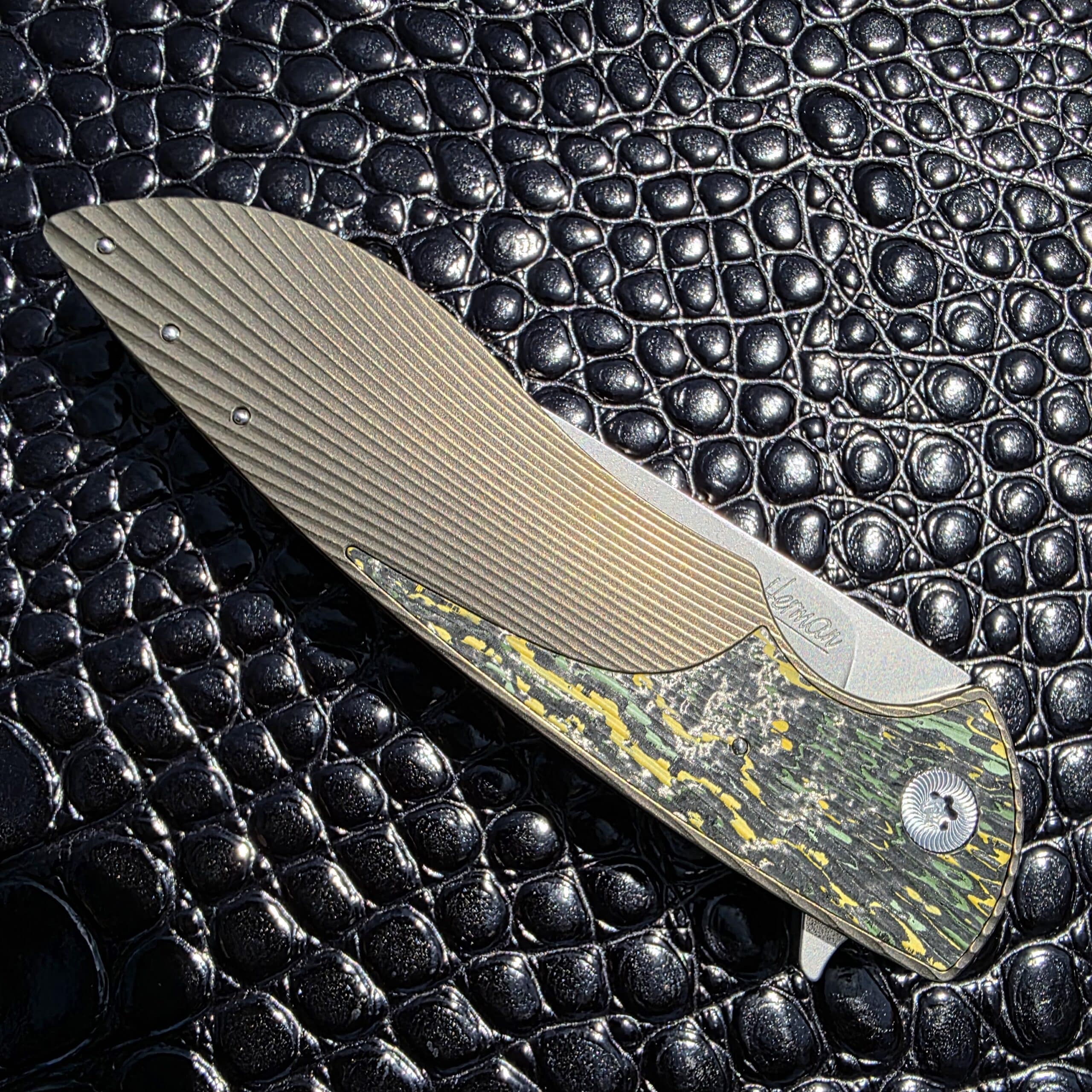 Closed show-side view of Herman Knives Sting Flipper