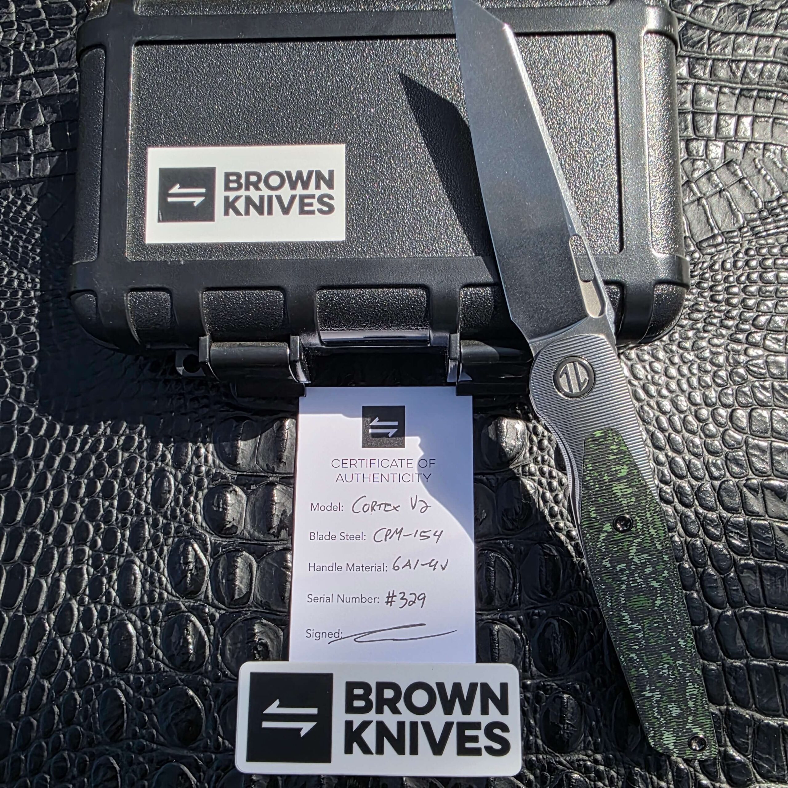 Provenance photo for Brown Knives Cortex V2 #329 with box and custom pivot tool