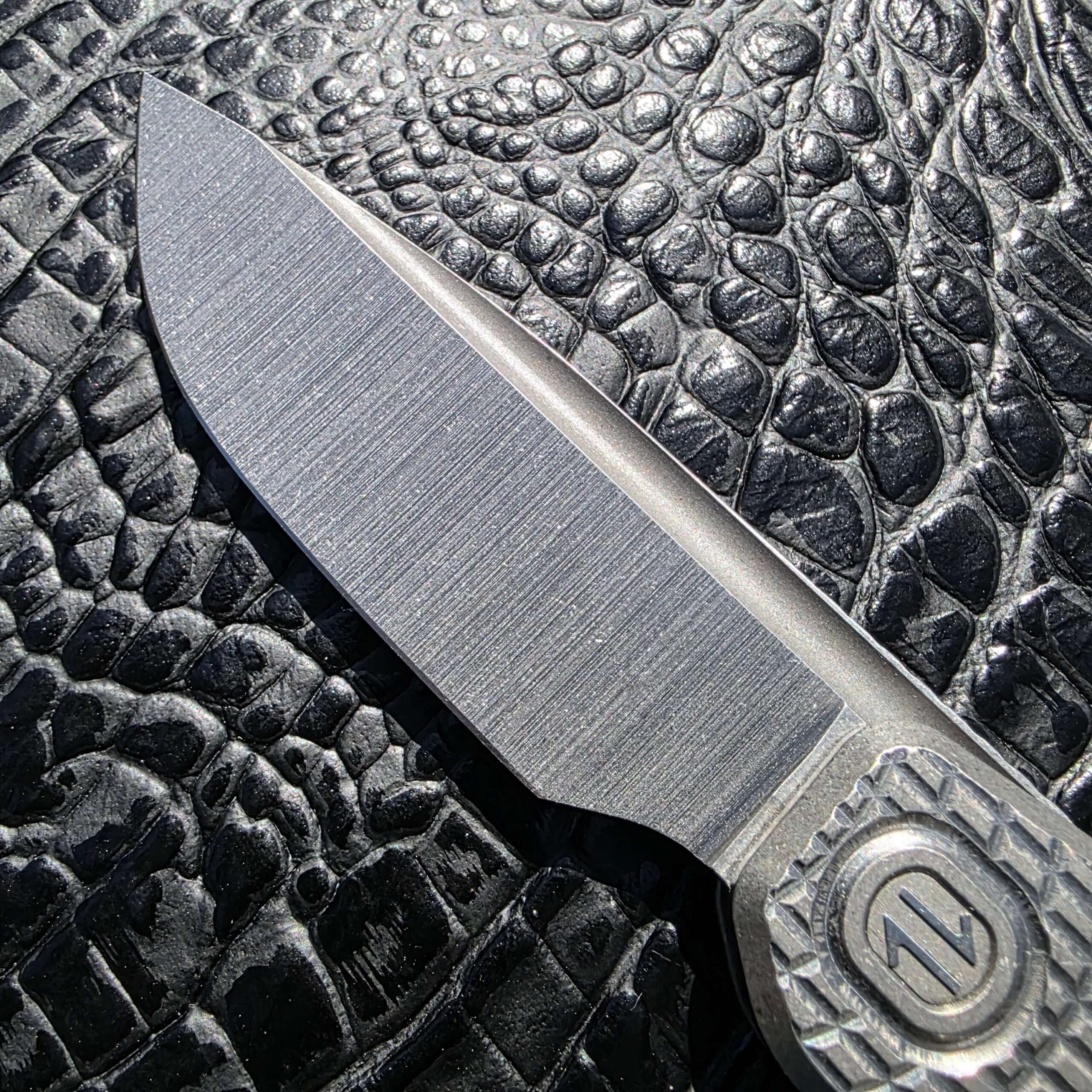Edge and hollow grind detail on Brown Knives Mini FSD #449 blade