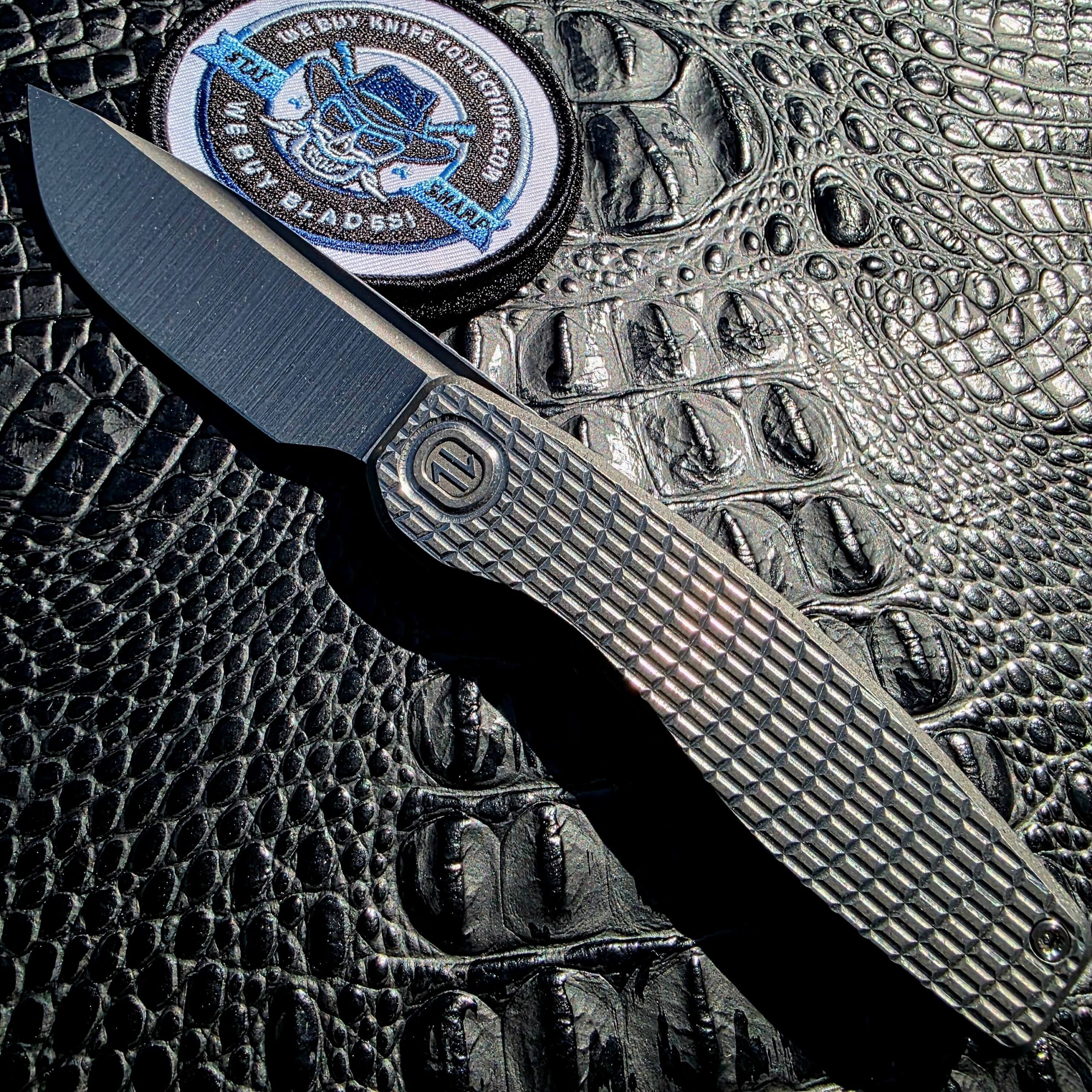 Brown Knives Mini FSD #449 open with stonewashed CPM-154 blade and titanium milling