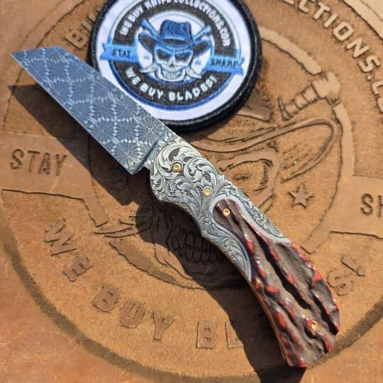 Curt Zimmerman Ranch Hand custom folding knife with mosaic Damascus blade and Sambar stag handle