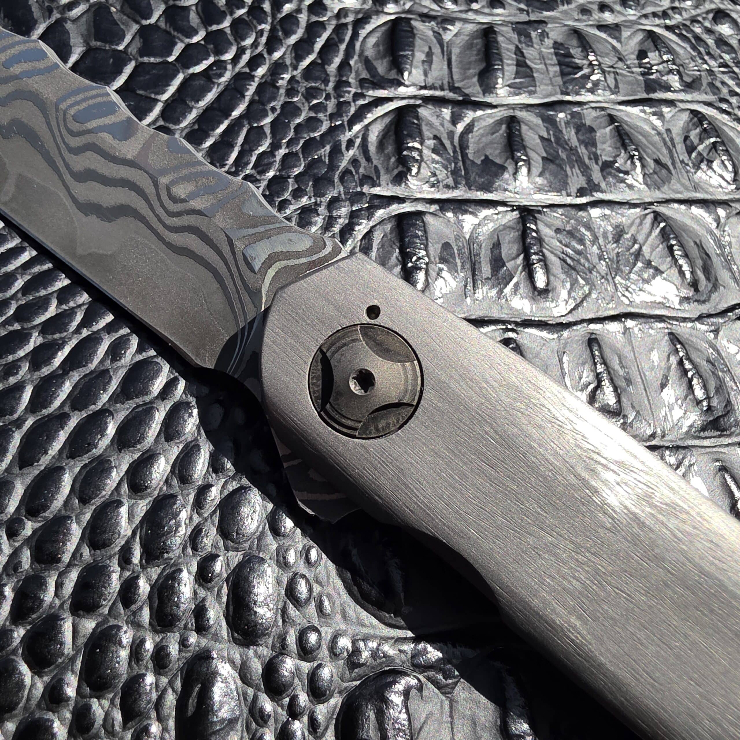 Titanium handle finish on Darac Steel Quintus custom knife