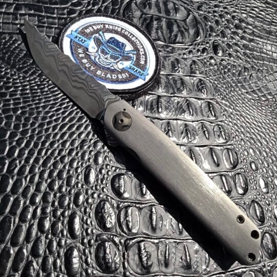 Darac Steel Quintus custom knife with San Mai XHP blade and titanium handle