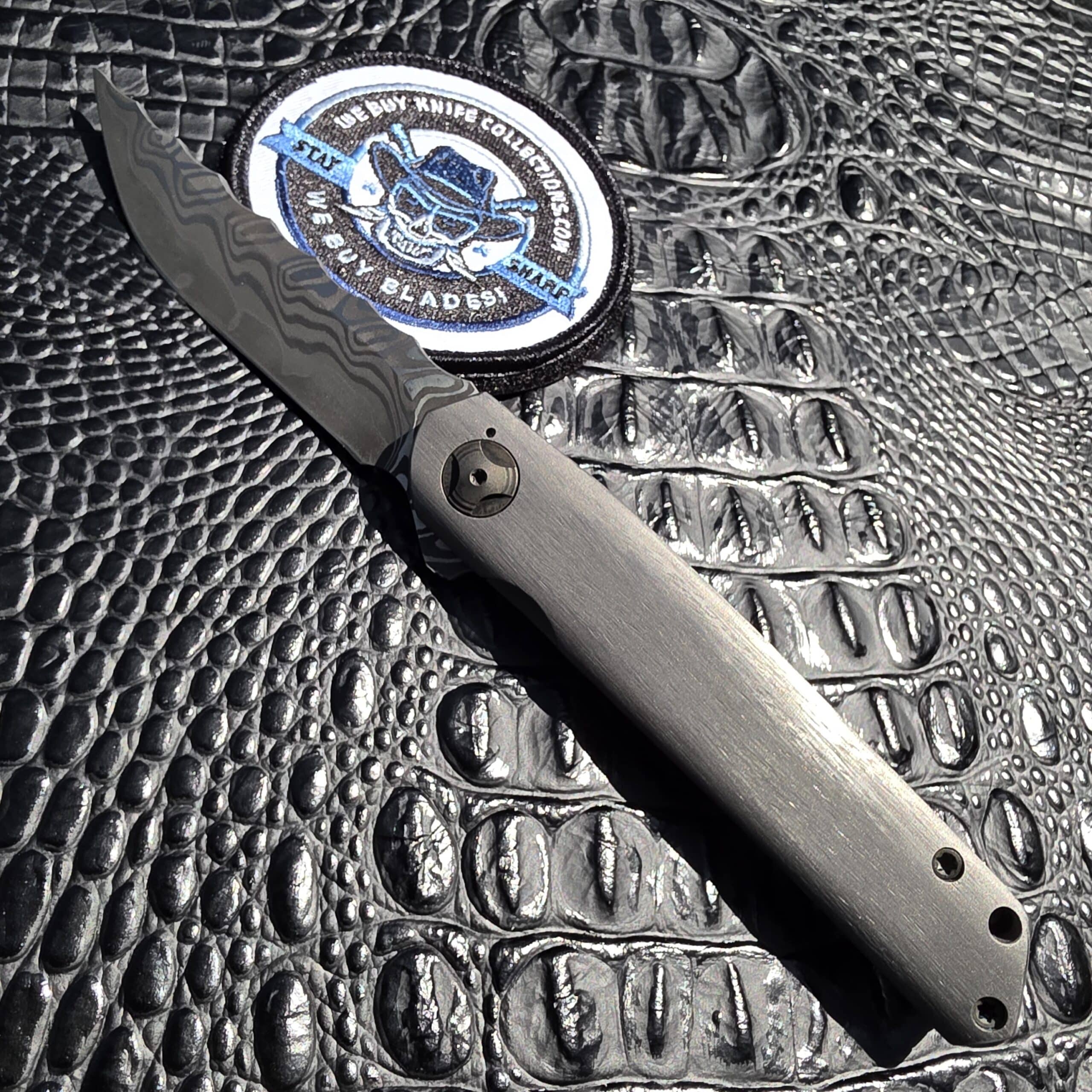 Darac Steel Quintus custom knife with San Mai XHP blade and titanium handle