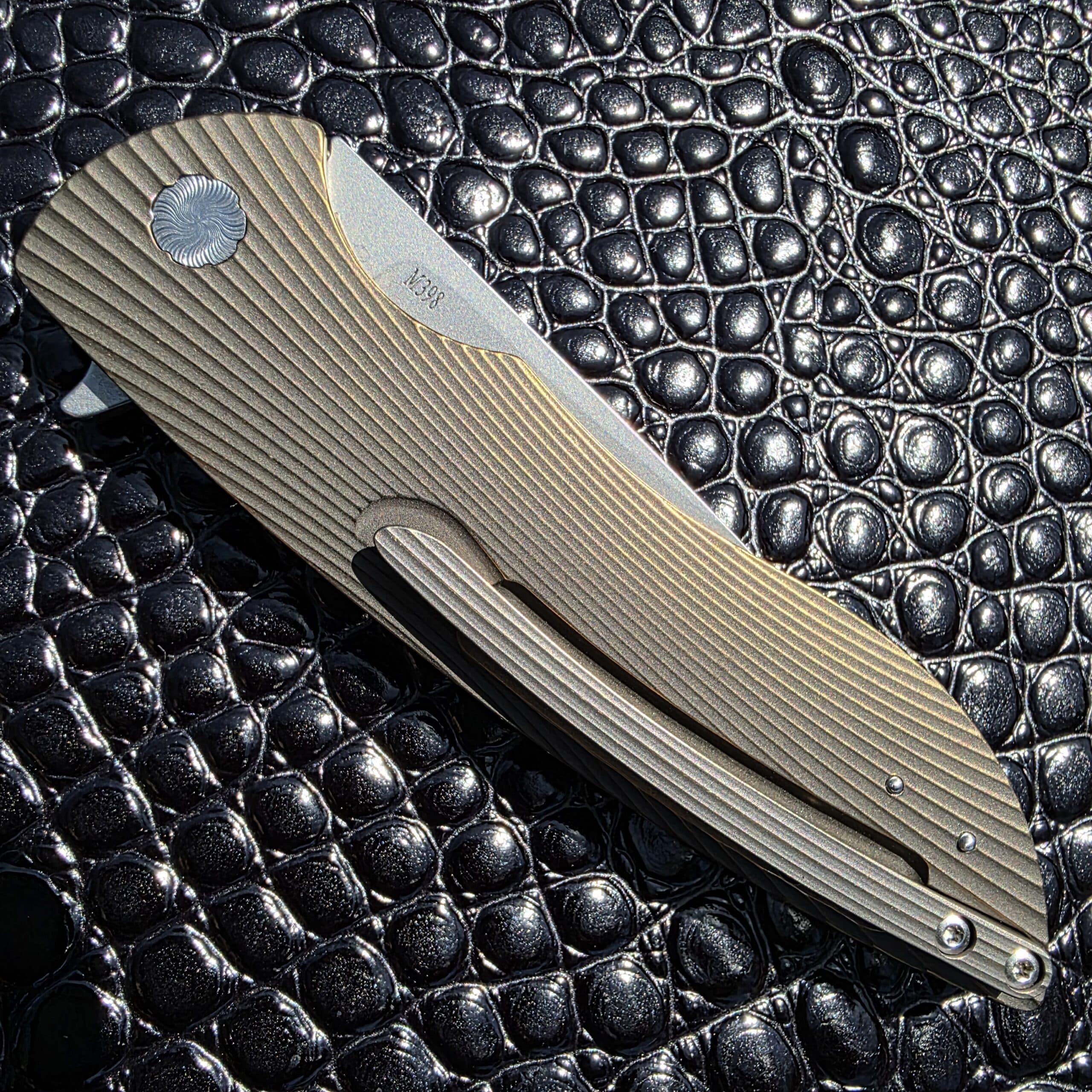 Milled titanium frame detail on Herman Knives Sting Flipper