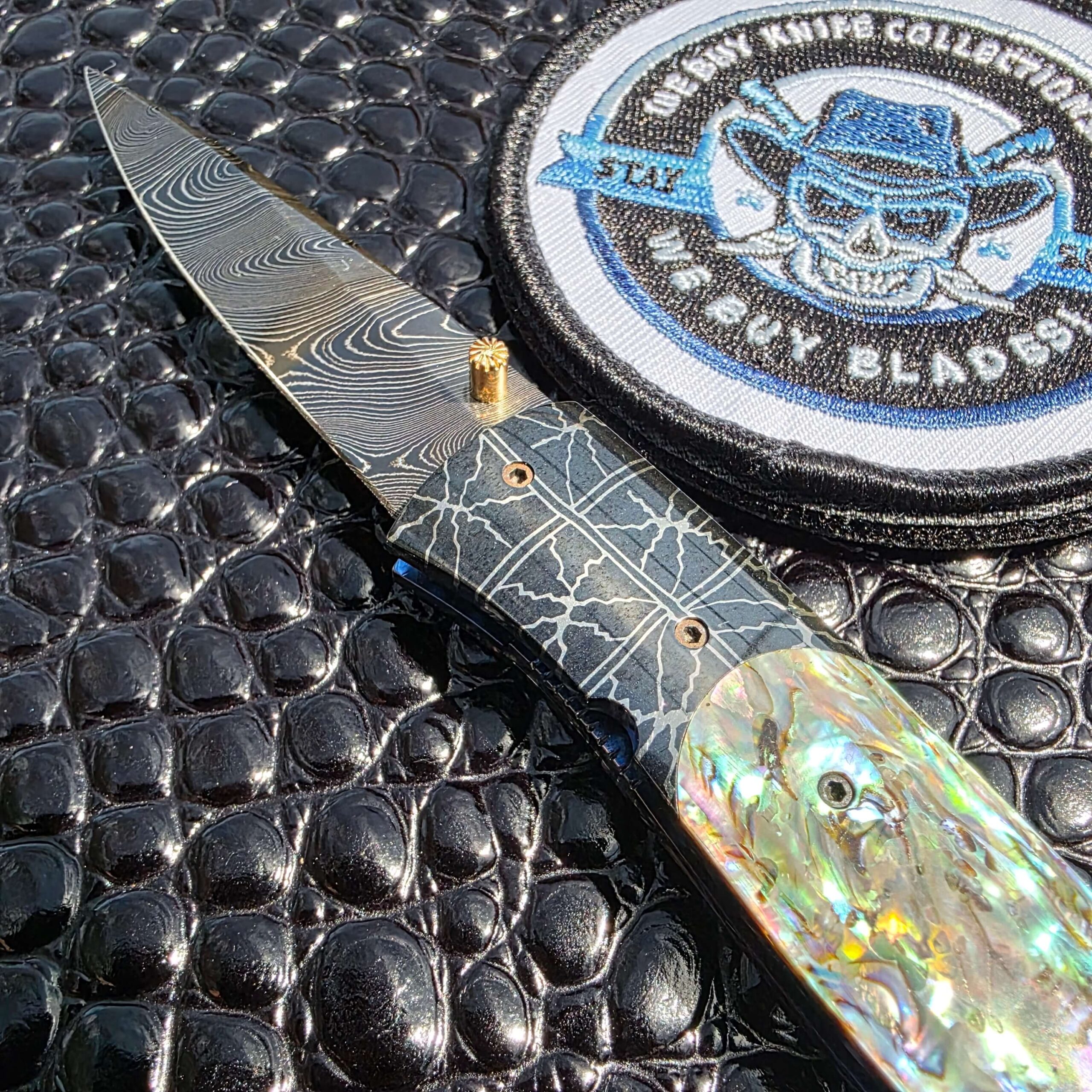 Abalone shell scale detail on Jeff Chaffee custom linerlock