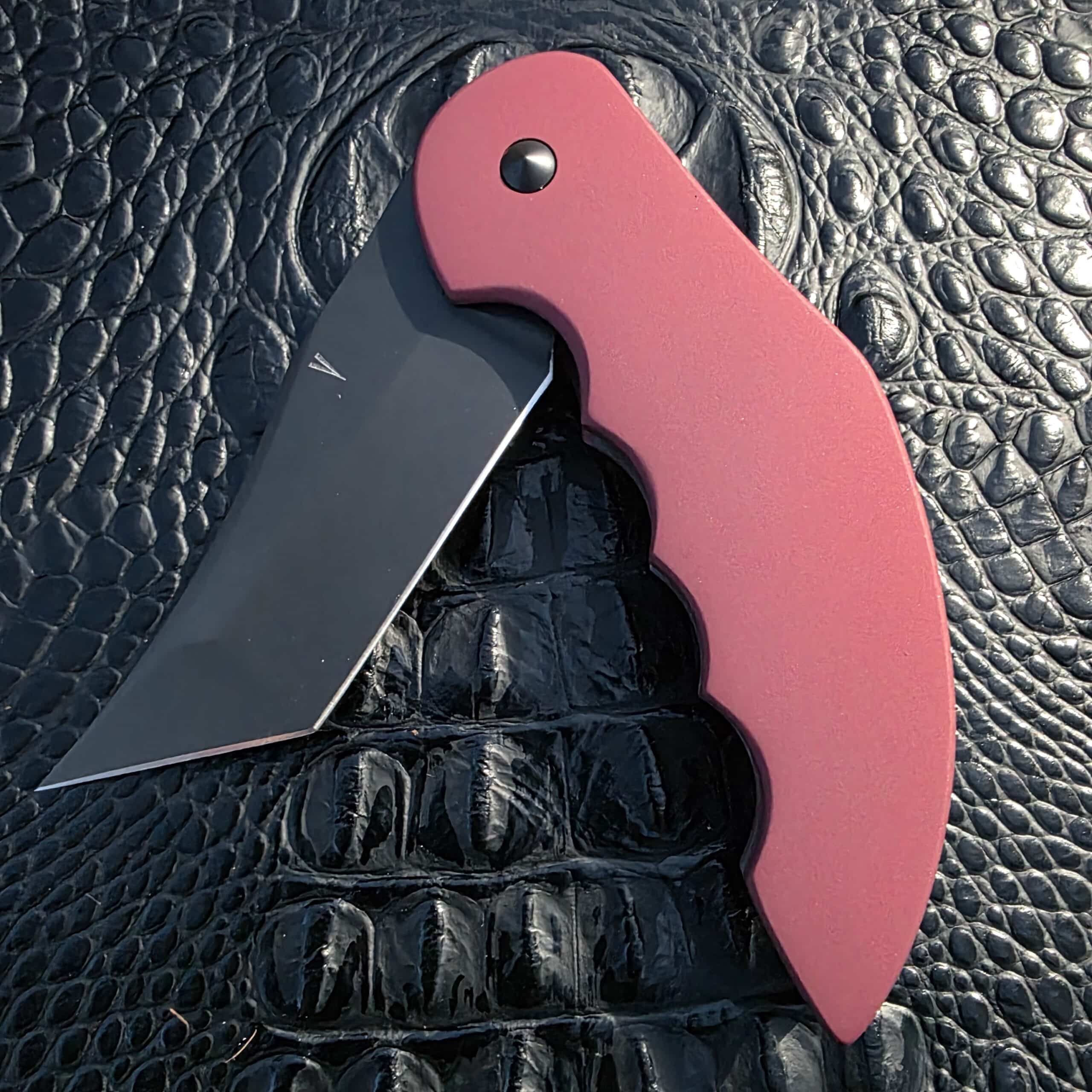 Red Cerakoted handle detail on Jeff VanderMeulen Homicide Tanto
