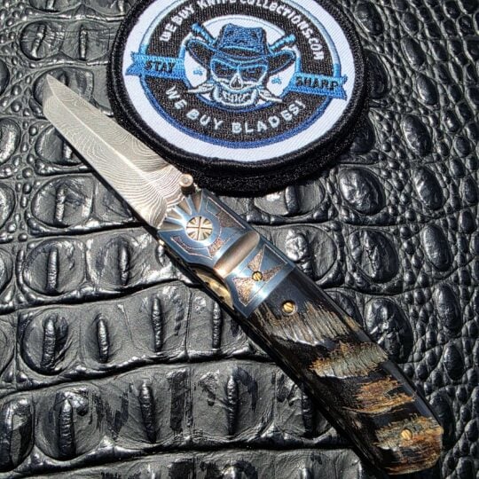 Mel Pardue custom engraved tanto linerlock with twist Damascus blade and buffalo horn handle