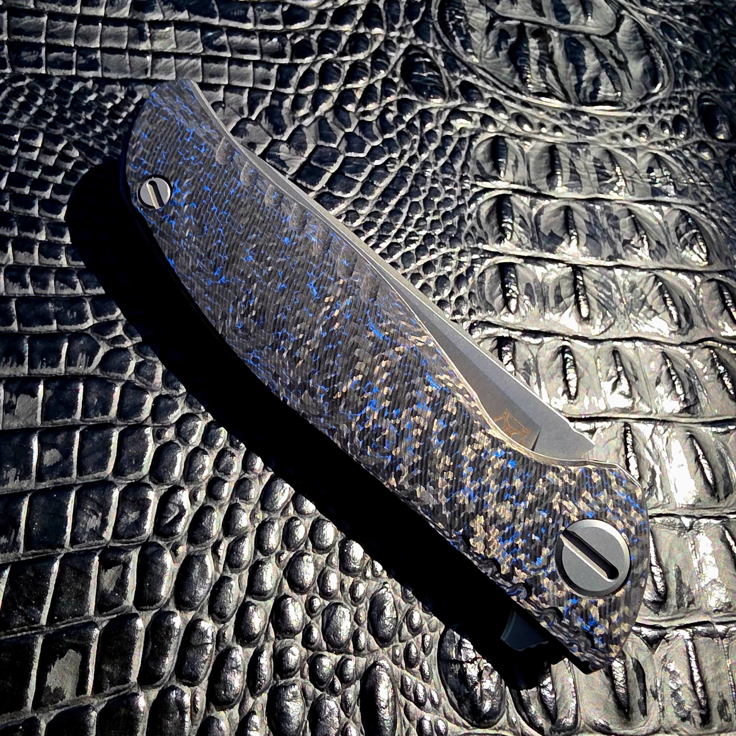 Secondary hero image of Shirogorov F3 NS showing Blue Carbon Fiber scales and stonewashed blade