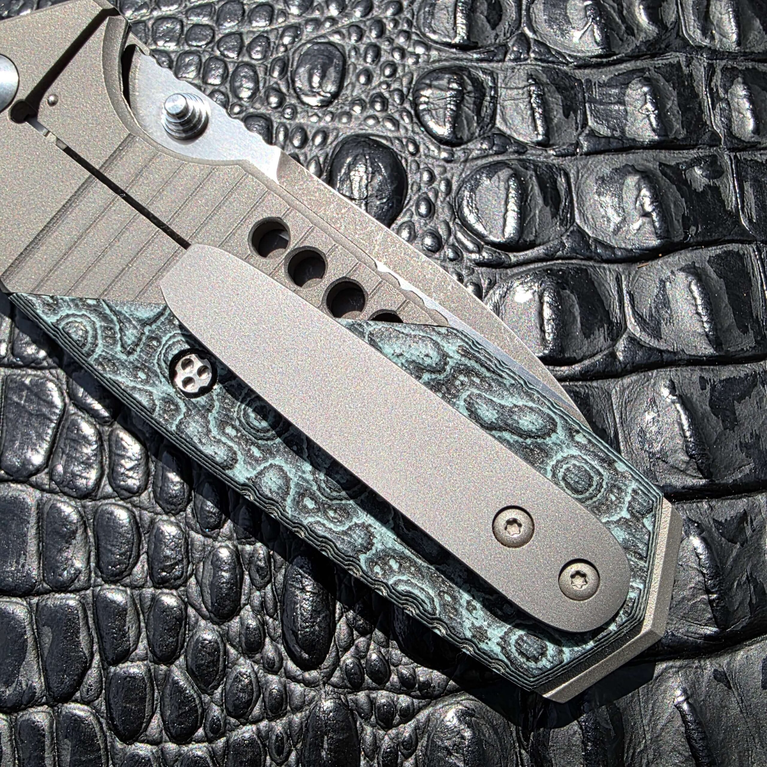 Titanium bead blasted clip on Allen Elishewitz Custom Tank