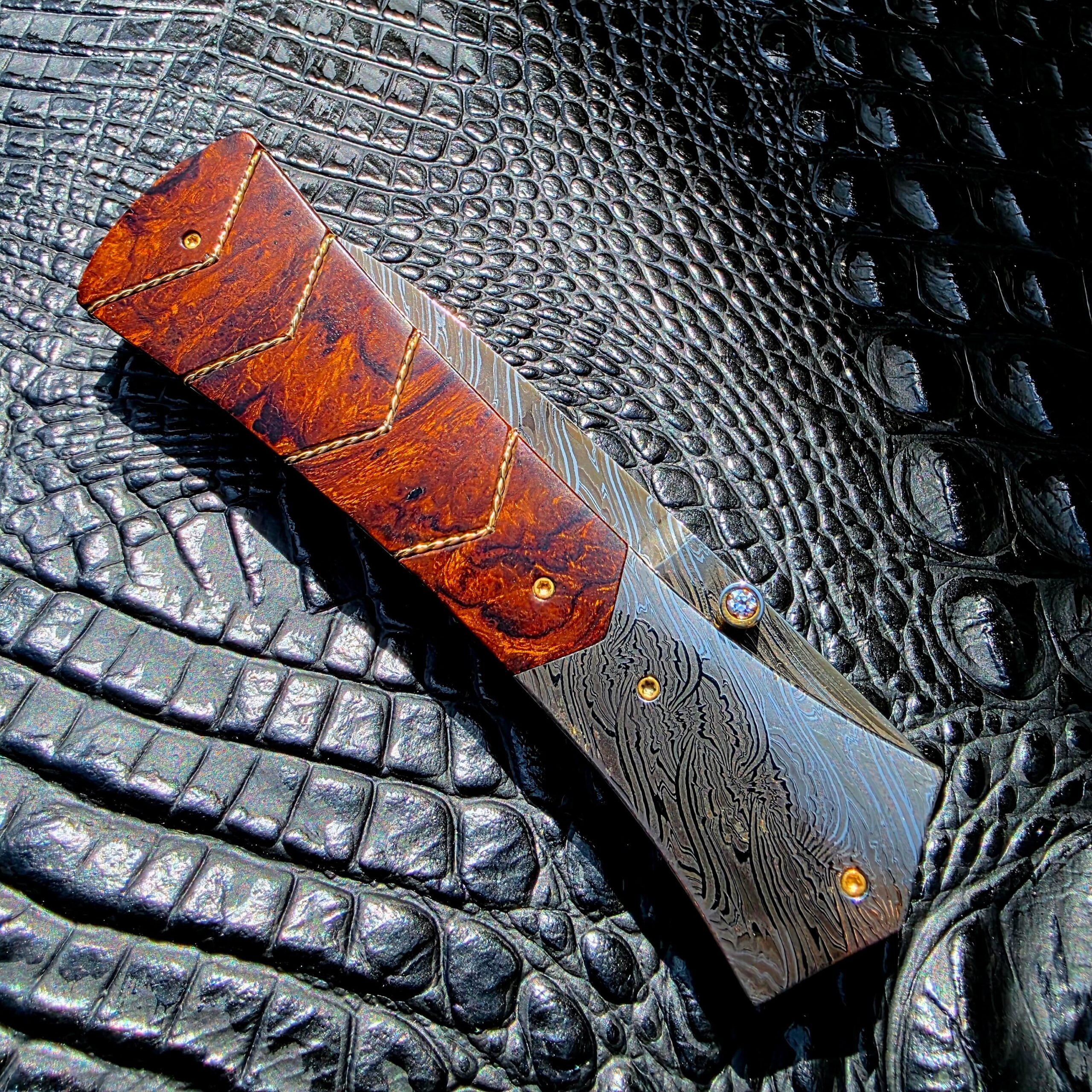 Closed show-side view of Bill Coffey Custom Folding Dagger with desert ironwood